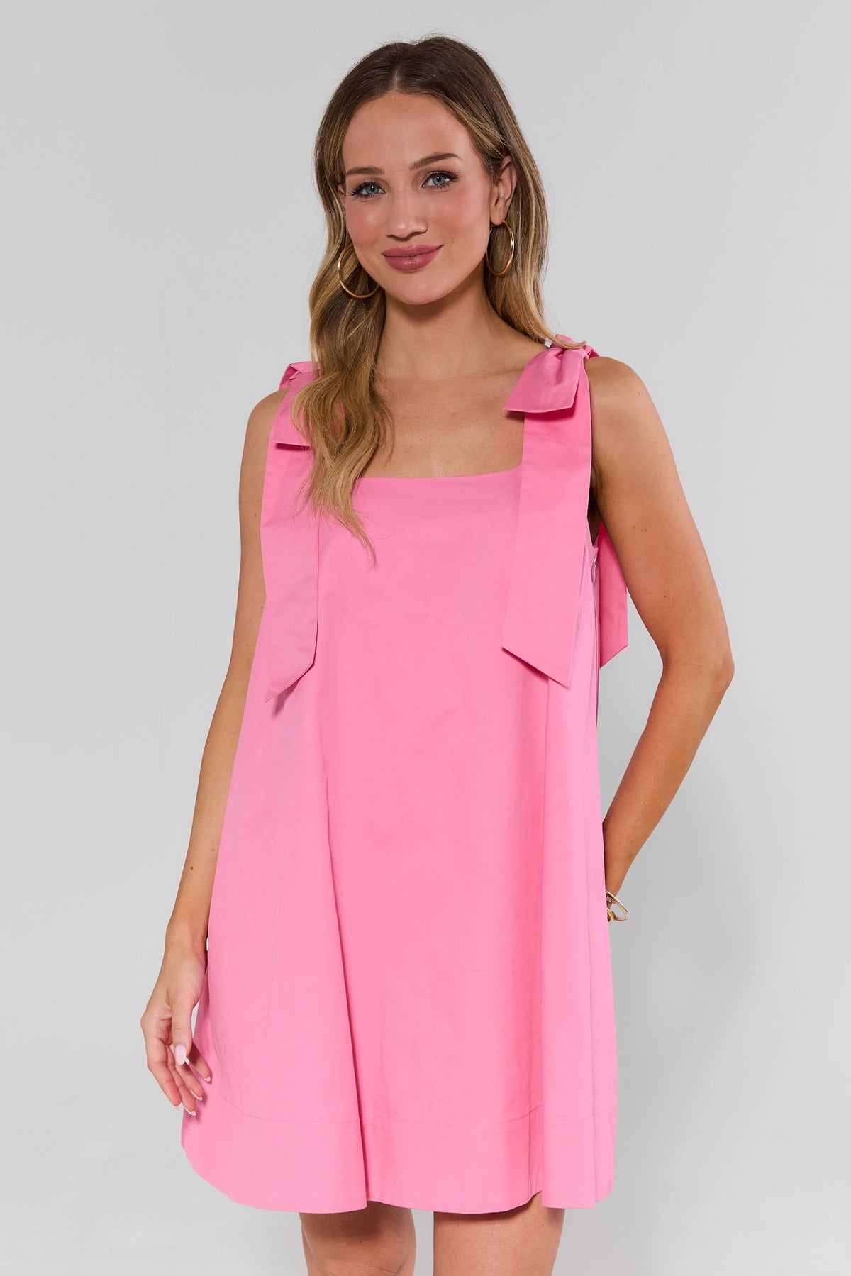 Pink bow strap short dress with square neckline and relaxed silhouette - Front View | Avara