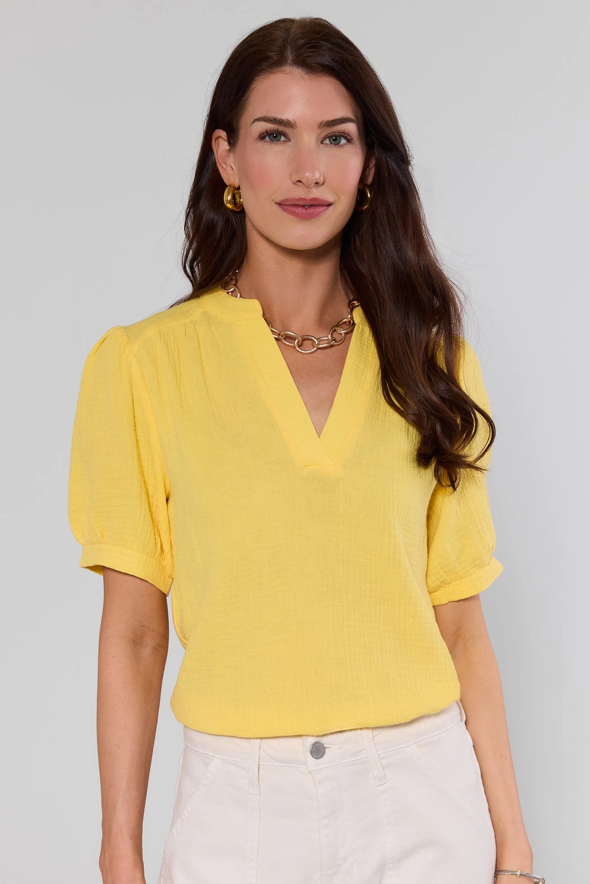 Yellow gauze puff sleeve top with V-neckline, front view on model - Tammy Top | Avara