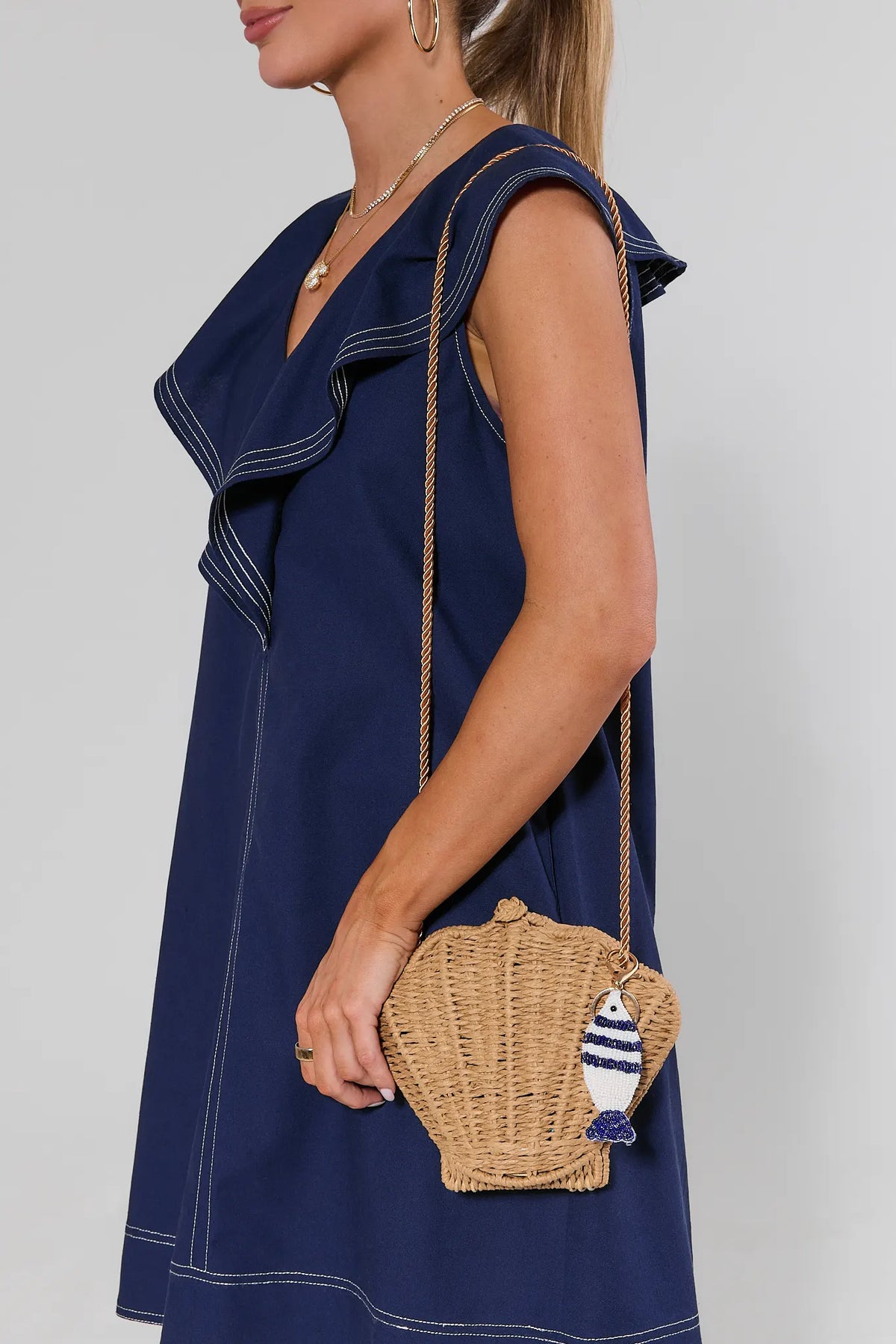 Beaded Fish Bag Charm Clipped onto Straw Wicker Bag - On Model Styled Look | Avara