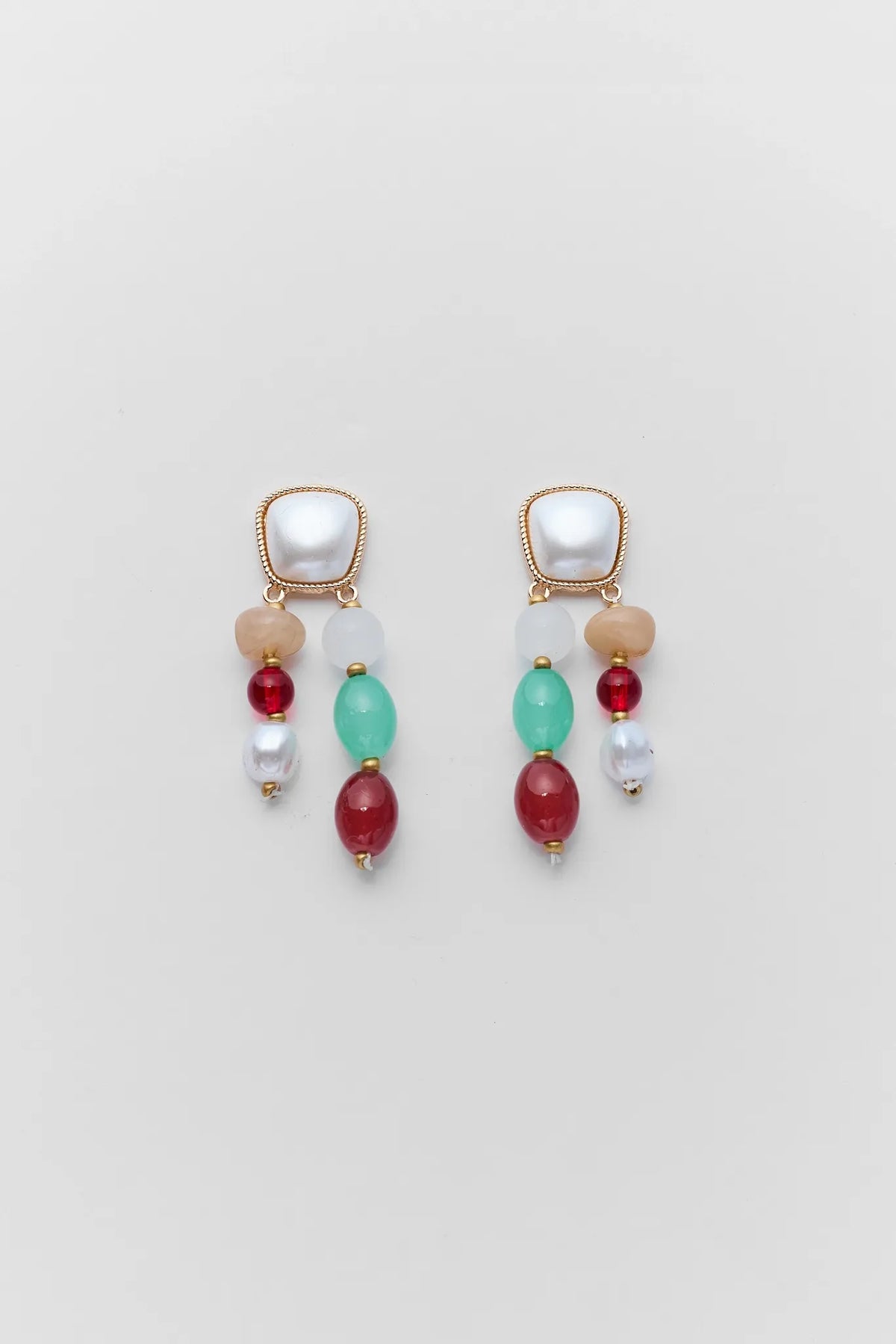 Colorful Mixed Stone Drop Earrings with gold-tone hardware, pearl studs, red, green & neutral beads - Flat Lay | Avara