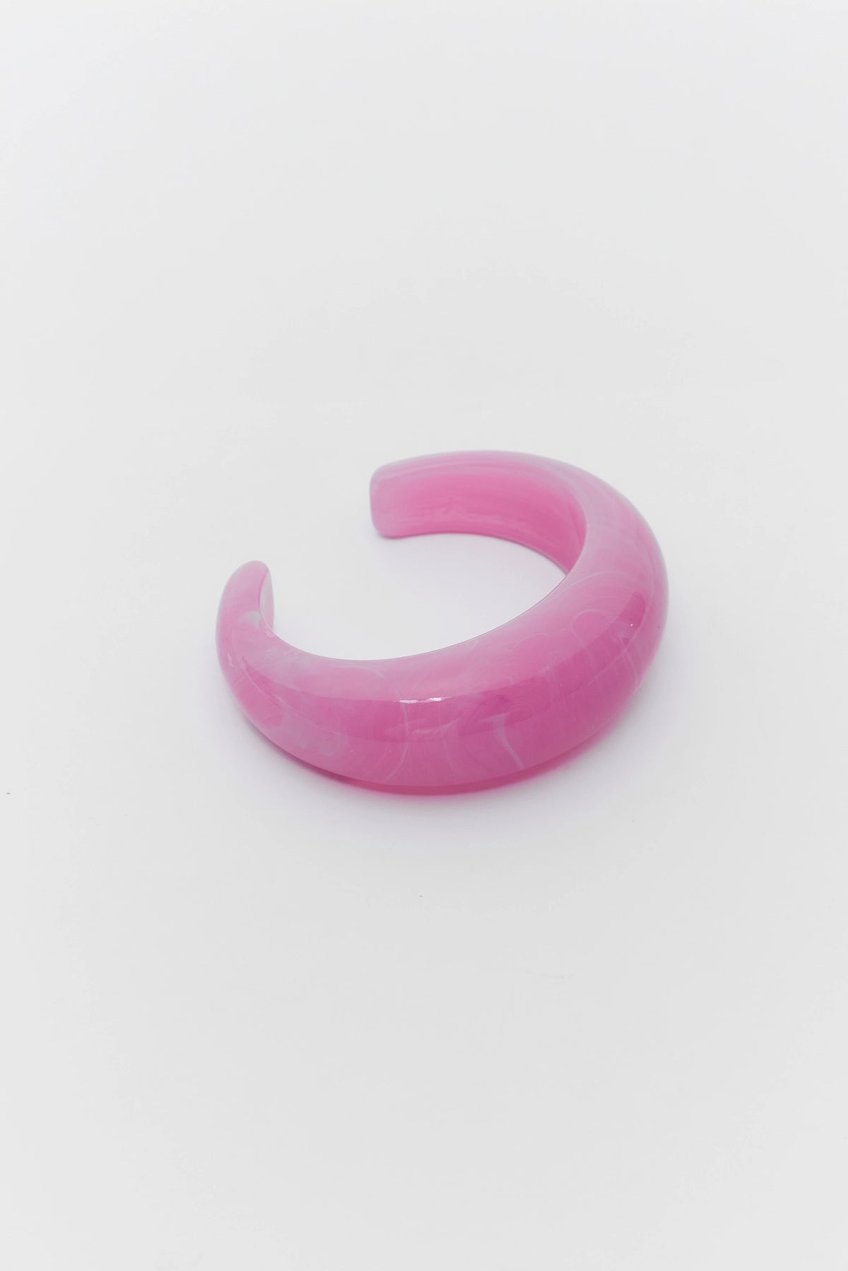 Pink bracelet cuff on a white background