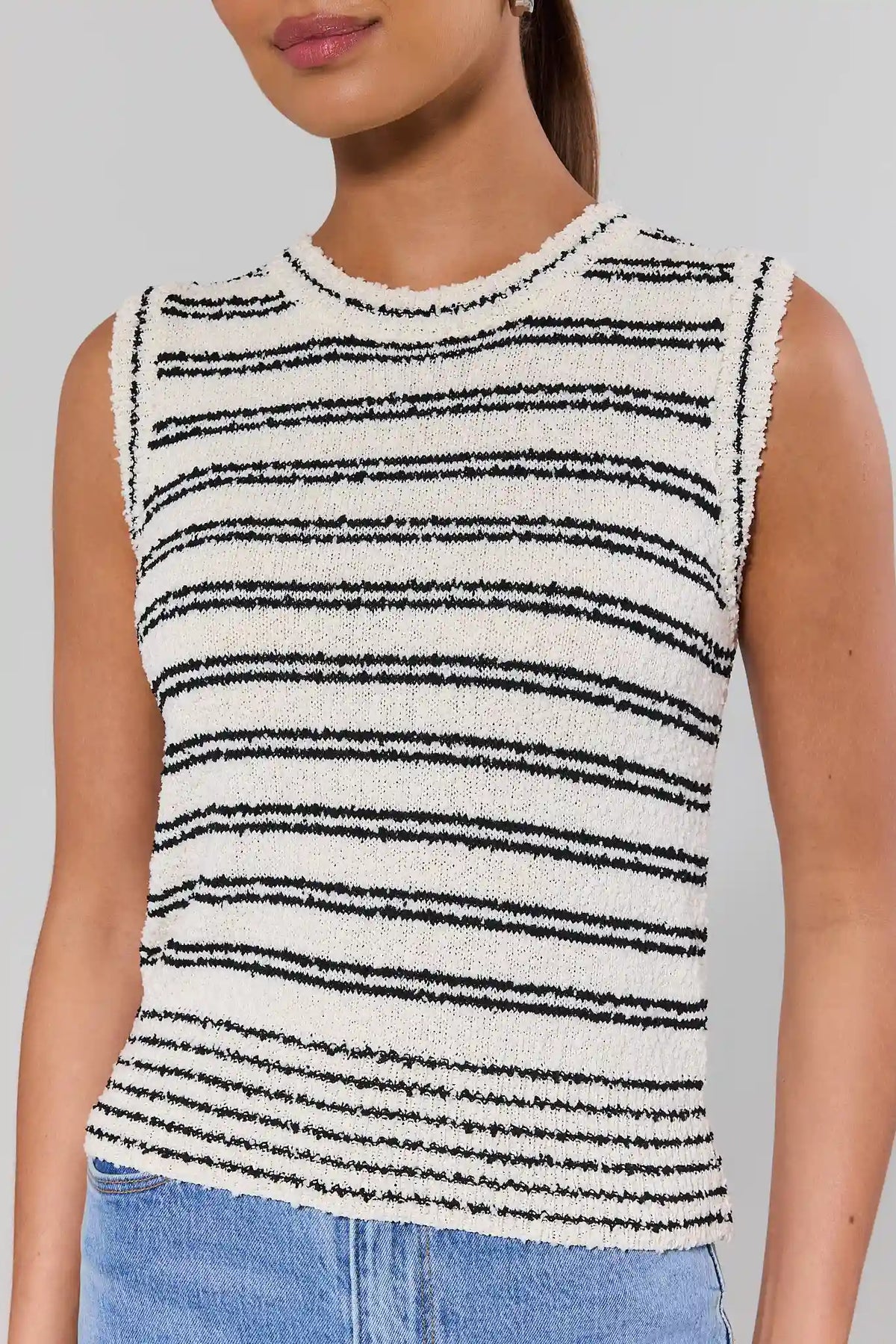 Close-up of white and black striped knit tank top with textured boucle fabric and crew neckline | Avara
