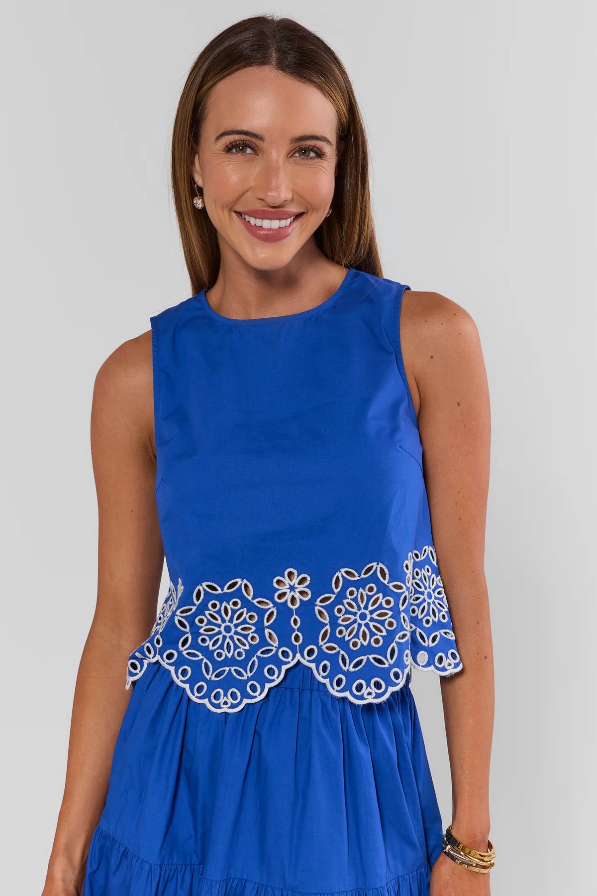 Royal Blue Eyelet Trim Tank Top with white floral hem detail - Front Close-Up On Model | Avara