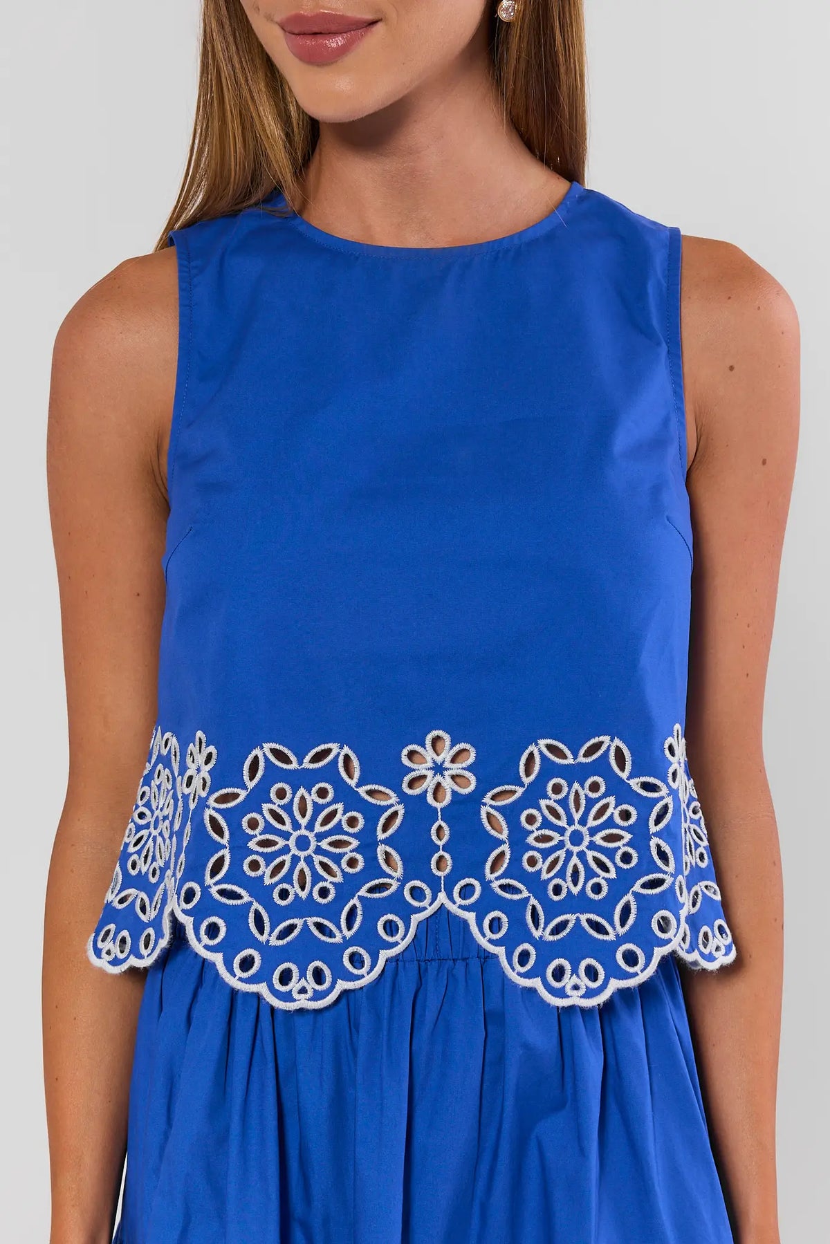 Blue Eyelet Trim Tank Top scalloped hem detail close-up, crew neckline, sleeveless | Avara