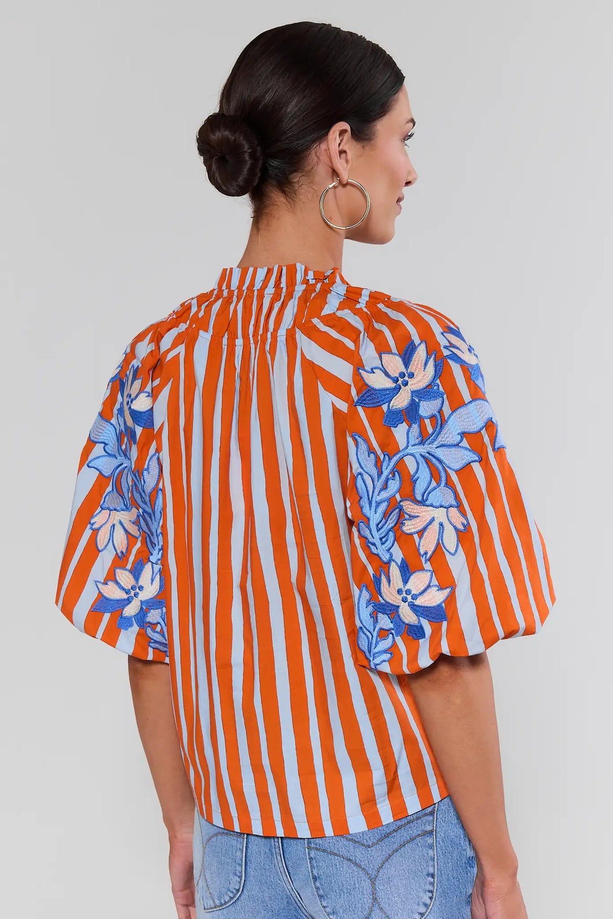 Orange striped embroidered top by THML with blue floral embroidery on puff sleeves - Back View | Avara