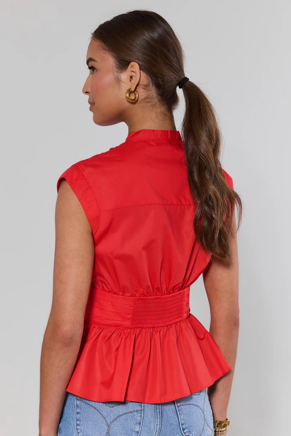 Red Peplum Tie Waist Top - Back View showing smocked waistband detail | Avara