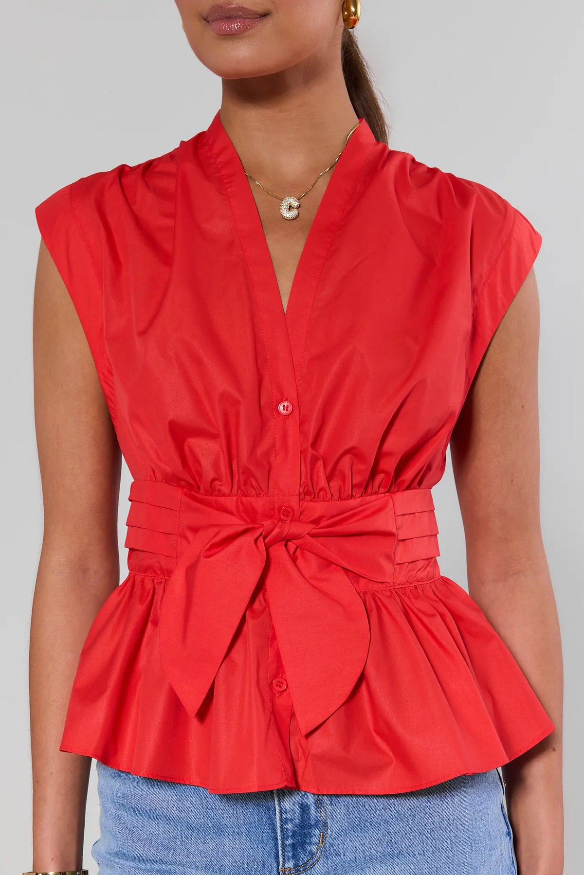 Red Tie Waist Peplum Top - Close Up Detail, Button Front & Cinched Waist Bow | Avara