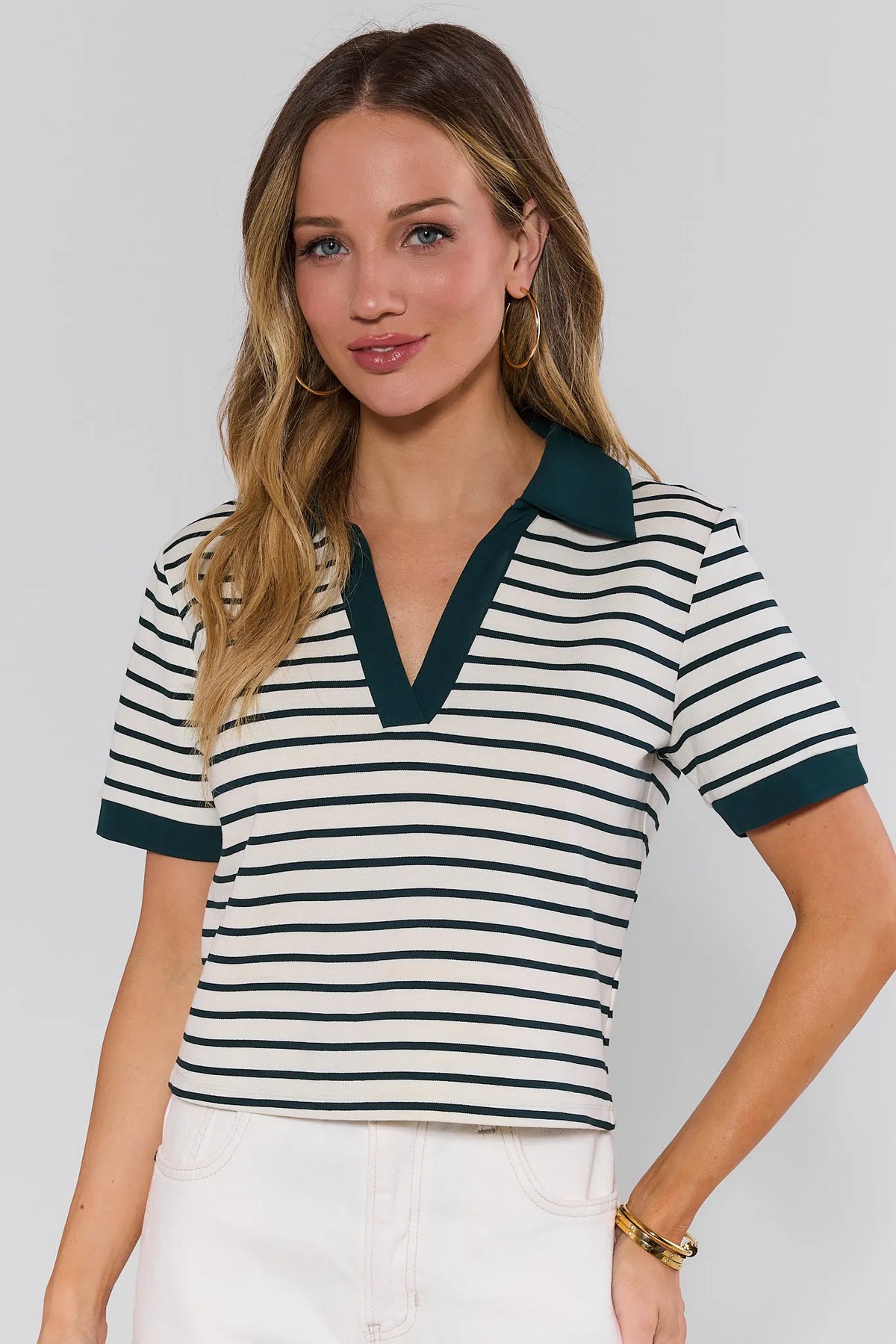 Green Striped Short Sleeve Polo Top with contrast trim, front view on model | Avara