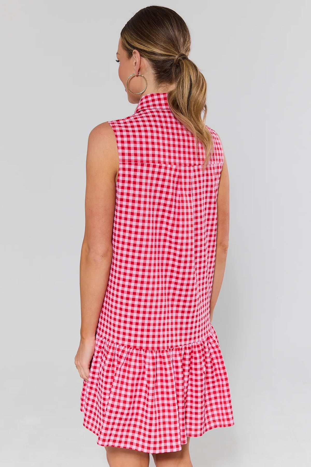 Back view of woman wearing red and white checkered short dress with collared neckline - Back View | Avara
