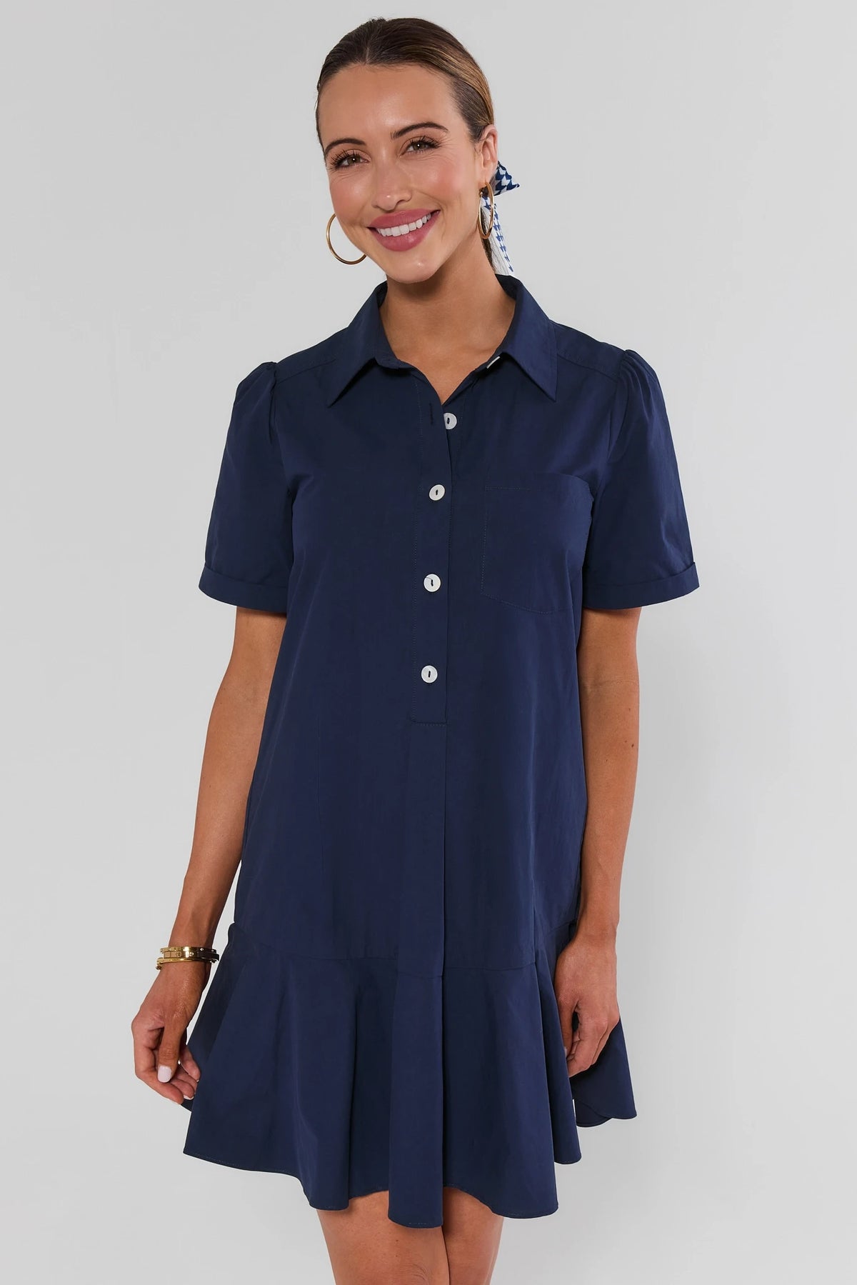 Meagan Navy Short Sleeve Drop Waist Dress with white buttons and collared neckline - Front View | Avara