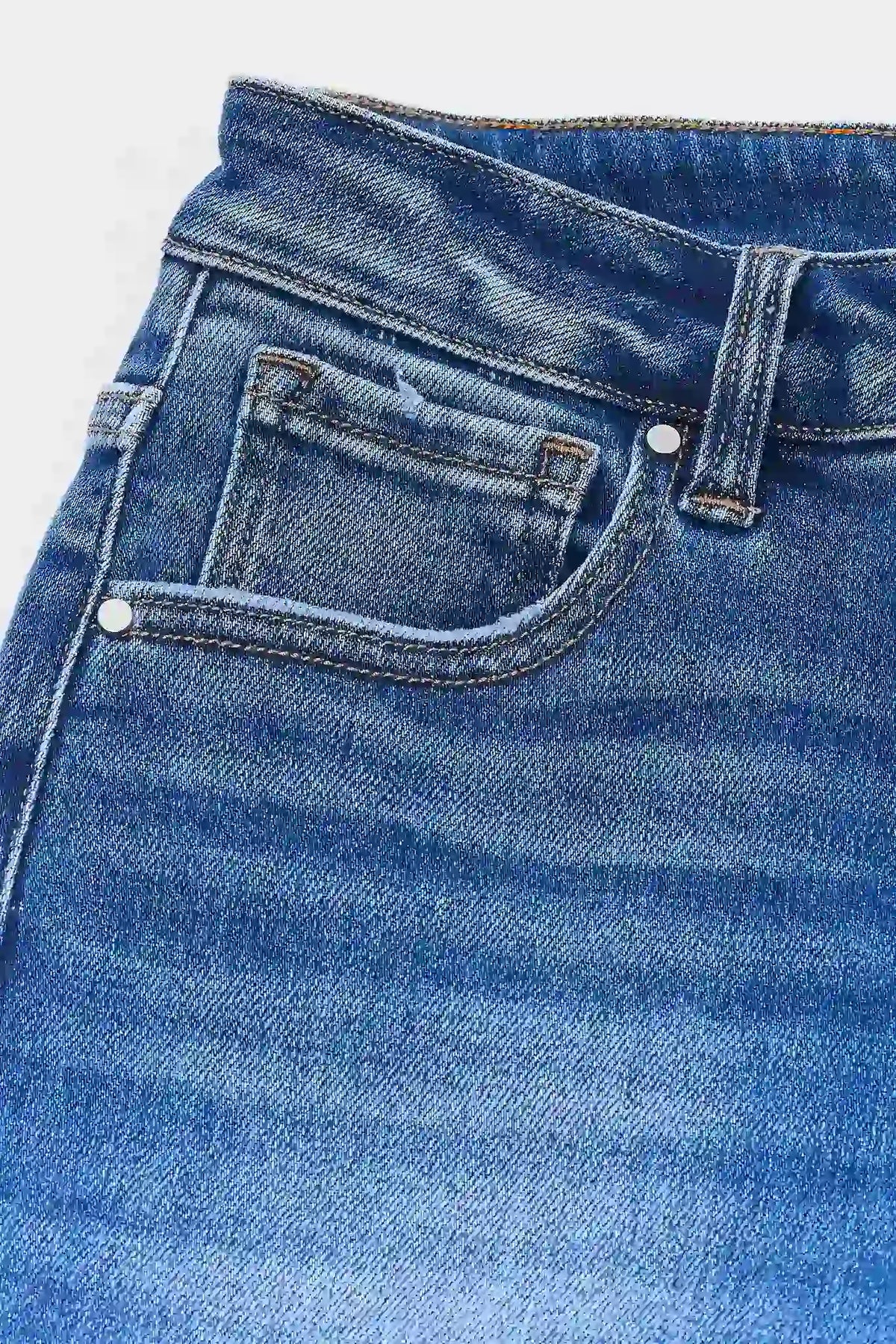 Medium Wash Denim Jeans - Front Pocket & Waistband Close-Up Detail | Avara