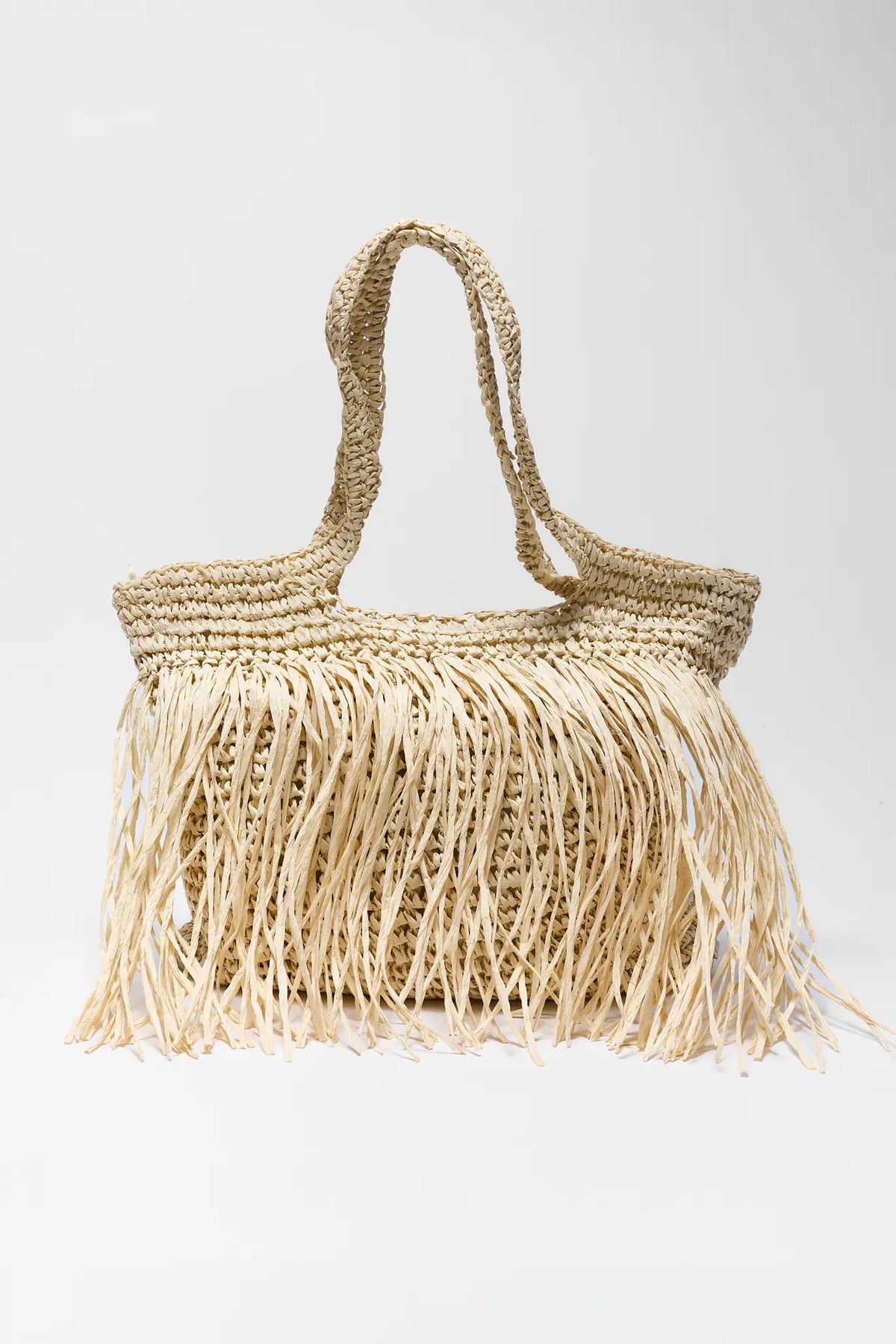 Tan raffia fringe tote with woven texture and double handles - Front View | Avara