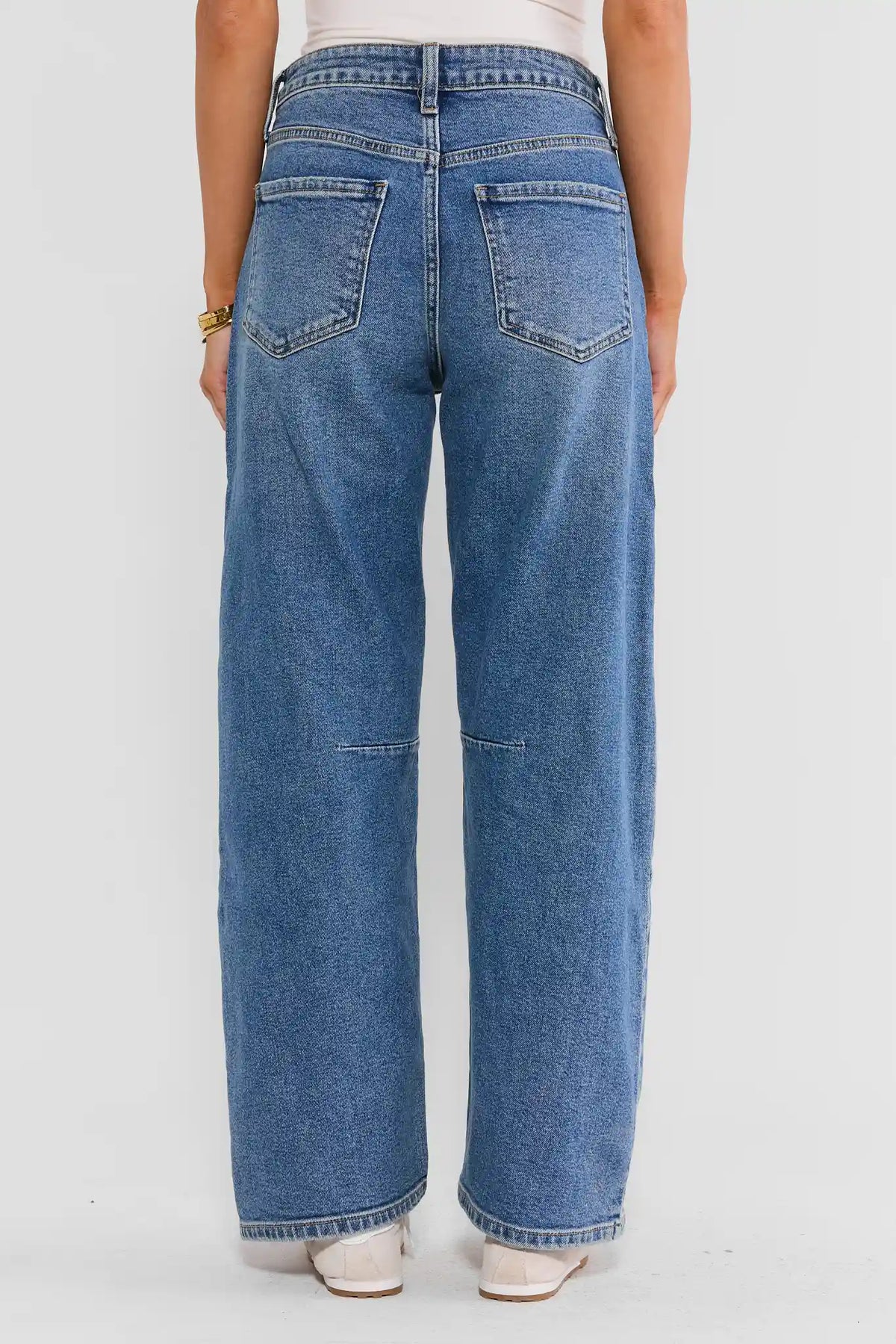 Medium Wash Harper Barrel Jeans - Back View Showing Curved Barrel Silhouette and Pockets | Avara