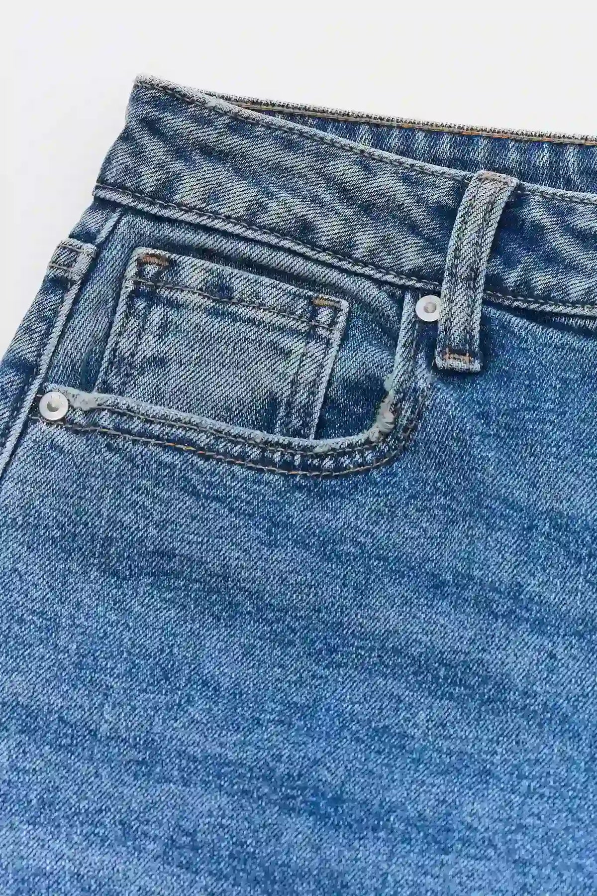Medium Wash Denim Barrel Jeans - Front Pocket and Waistband Close-Up Detail | Avara
