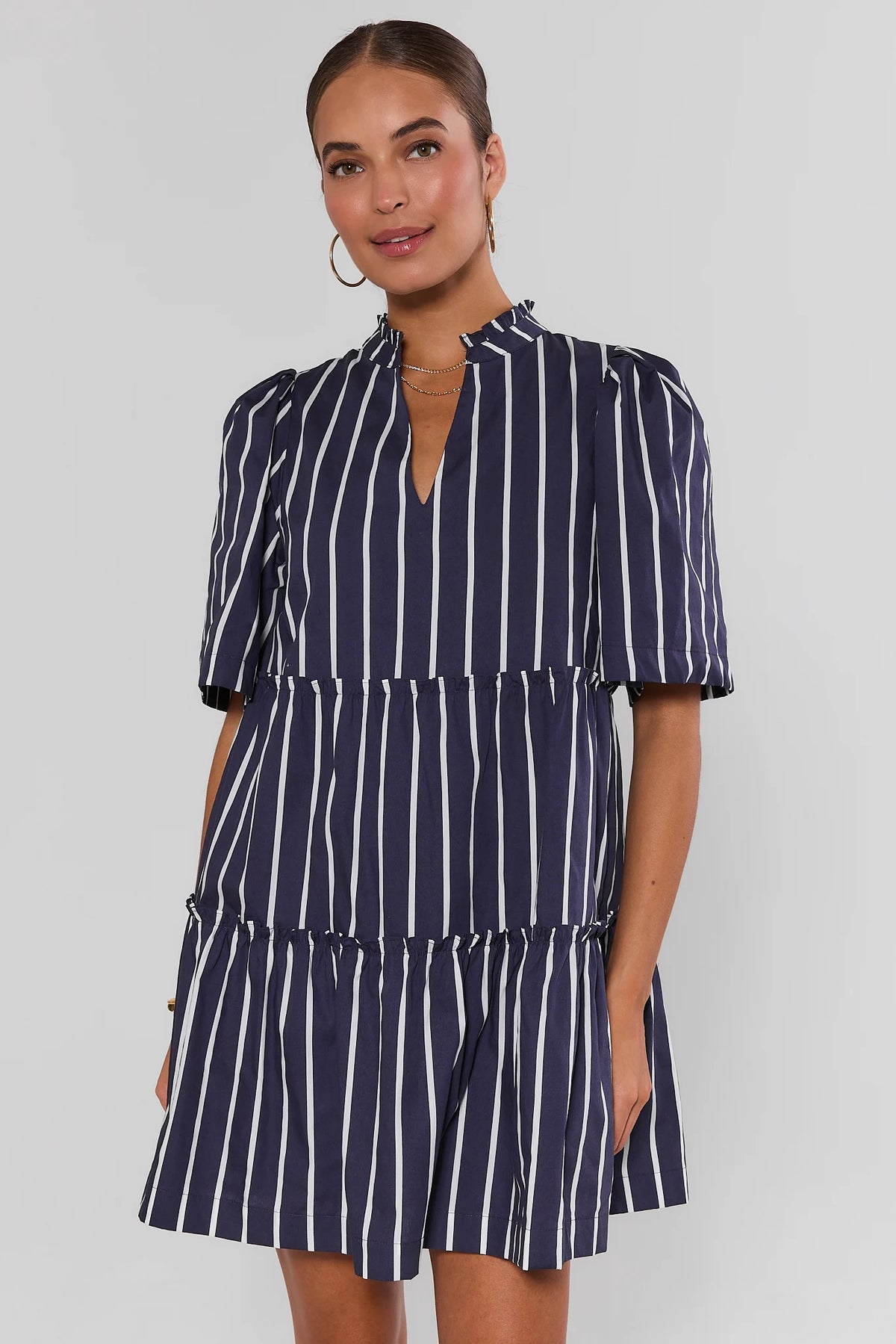 Navy white striped tiered short dress, ruffled band collar, puff sleeves - Front View | Avara