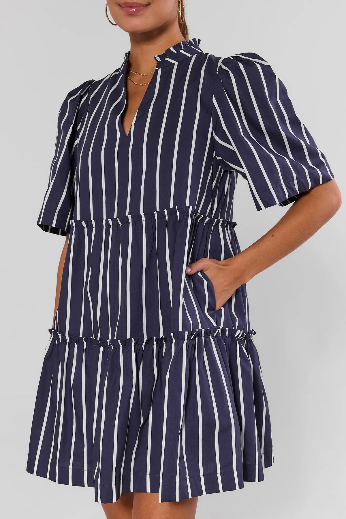 Navy striped tiered dress with ruffle hem tiers and pockets - Close-Up Detail | Avara