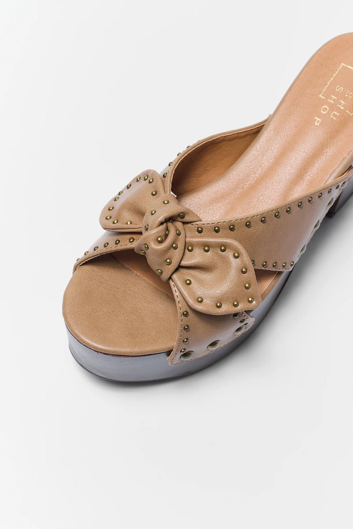 Cute Brown Faux Leather Platform Heels - Close-Up Bow & Stud Detail | Avara