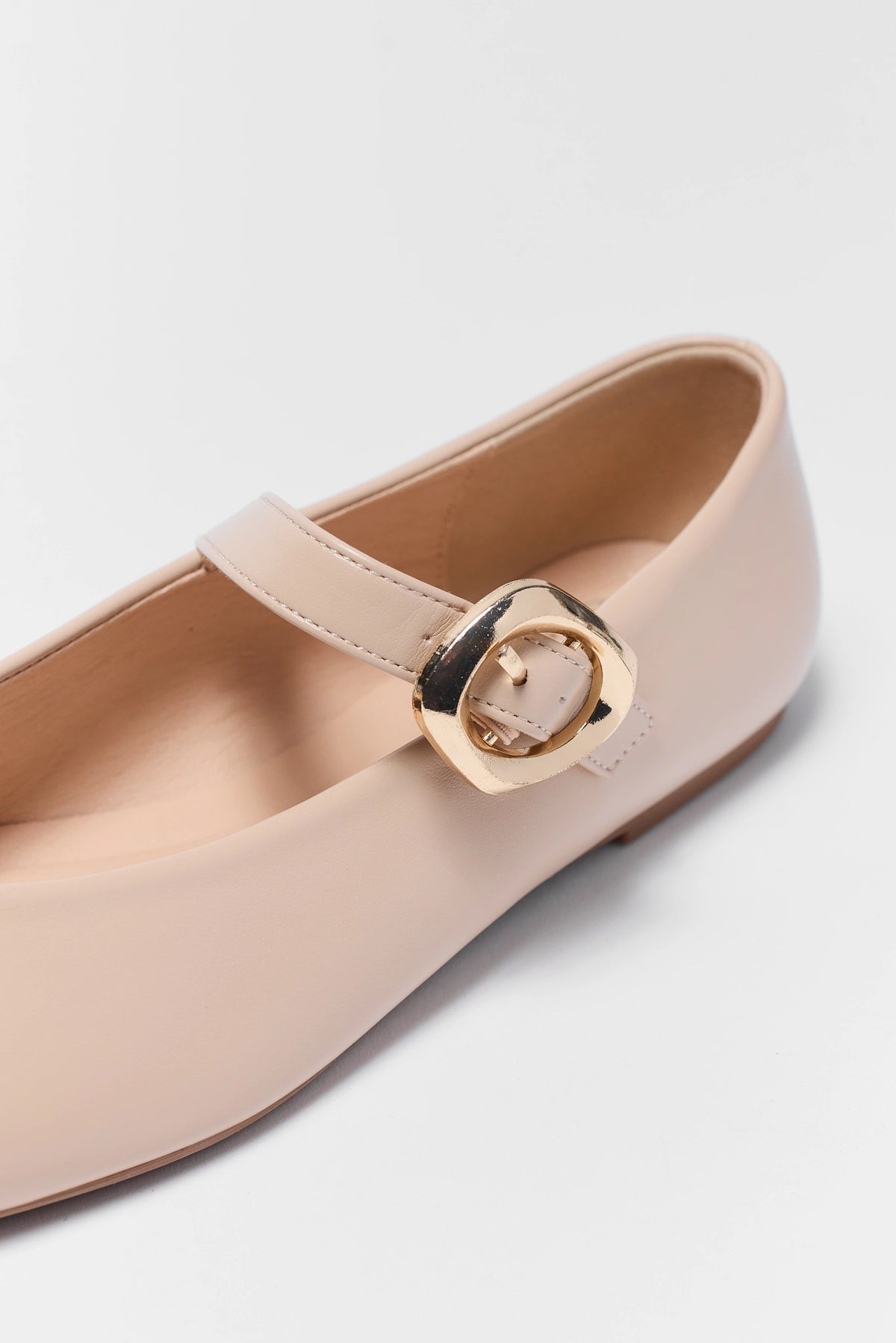 Nude Ballet Flats with Strap Close-Up Gold Buckle Detail | Avara