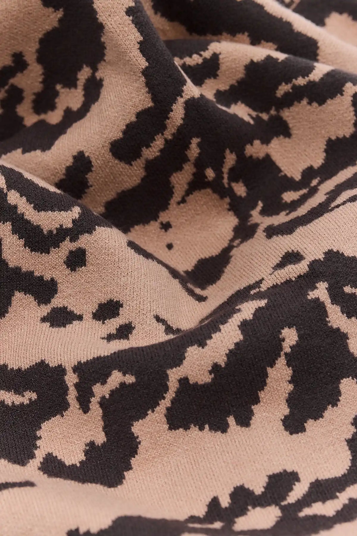 Tan and Black Animal Print Knit Fabric Texture Close-Up - Soft Knit Detail, Jackie Dress | Avara