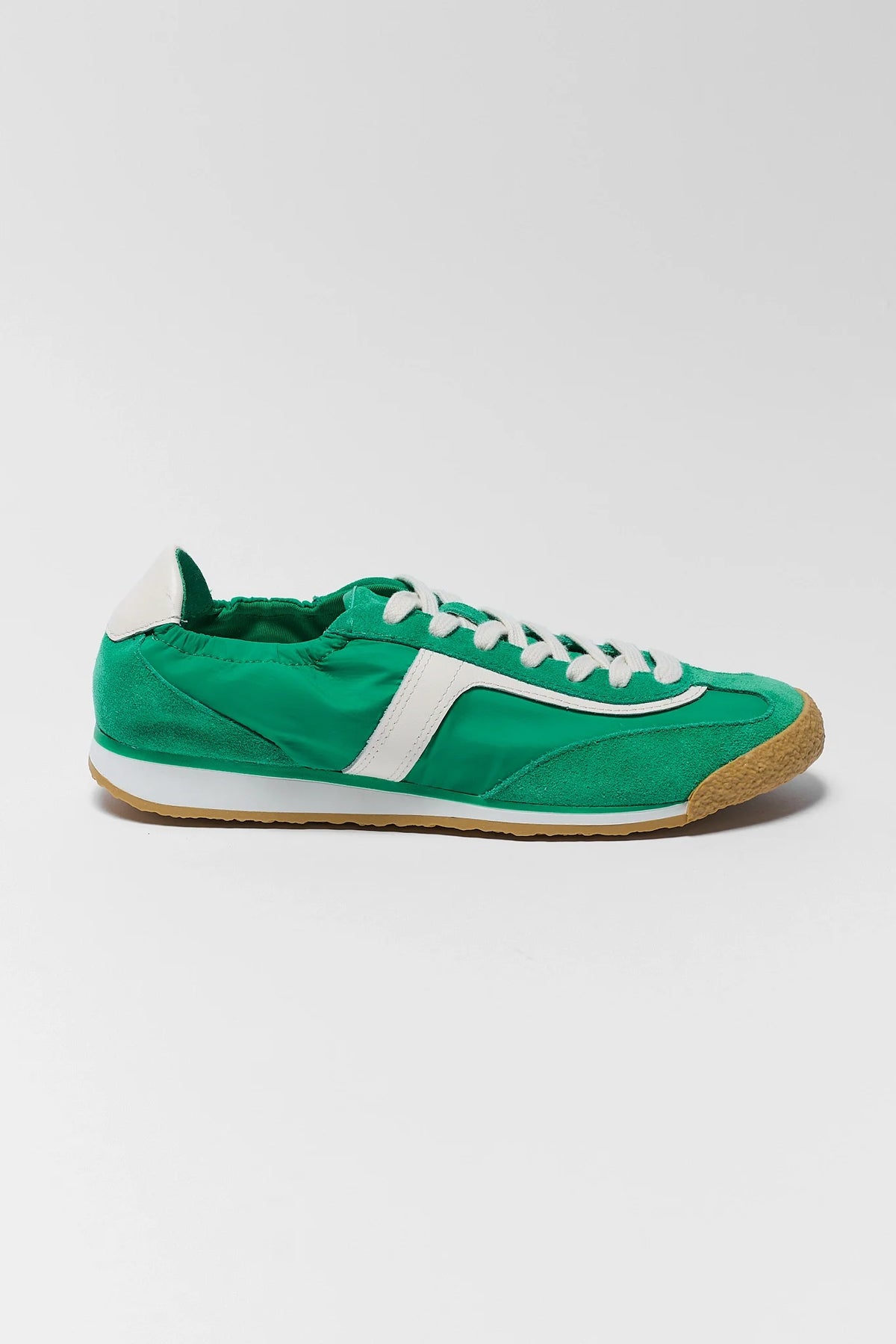 Green Dolce Vita Sariya Sneaker - Side Profile with White Stripe & Gum Sole | Avara