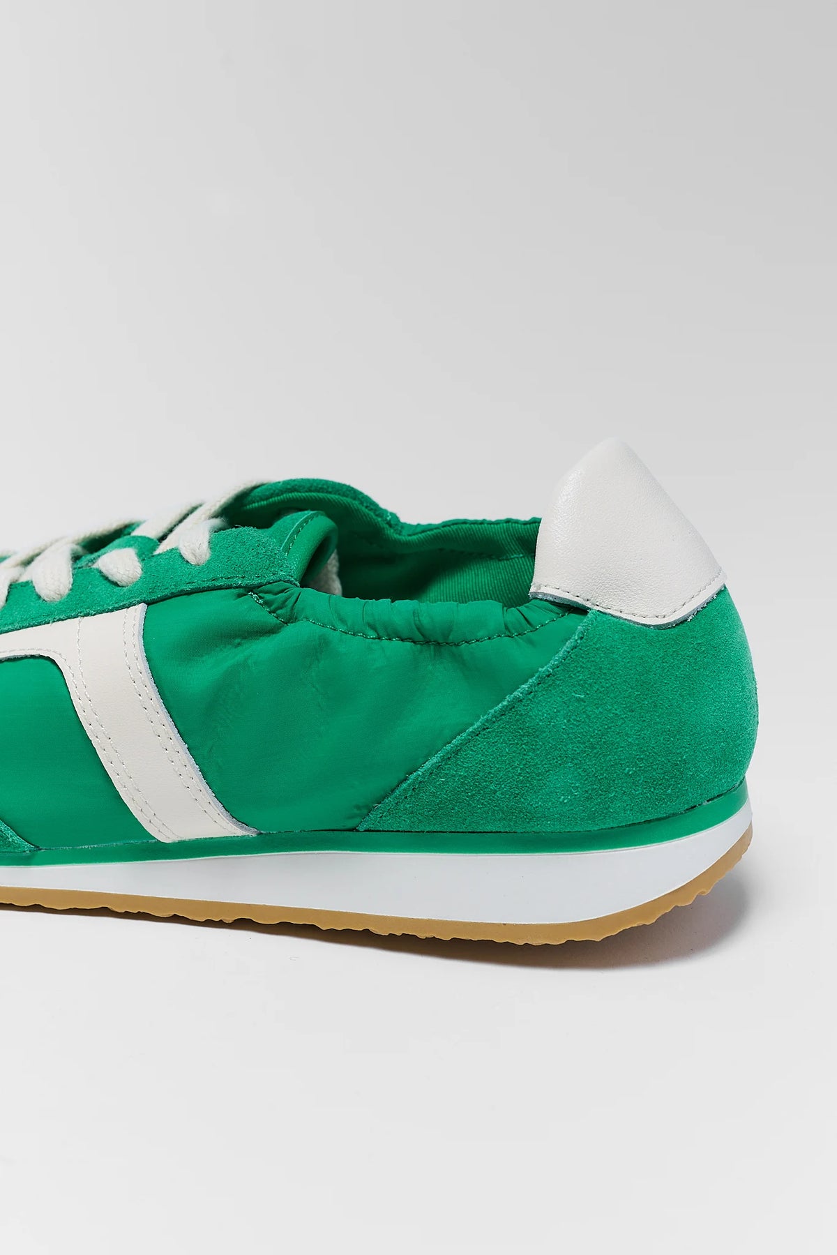 Close-Up of Green Suede Dolce Vita Sariya Sneaker - Heel & Side Detail | Avara