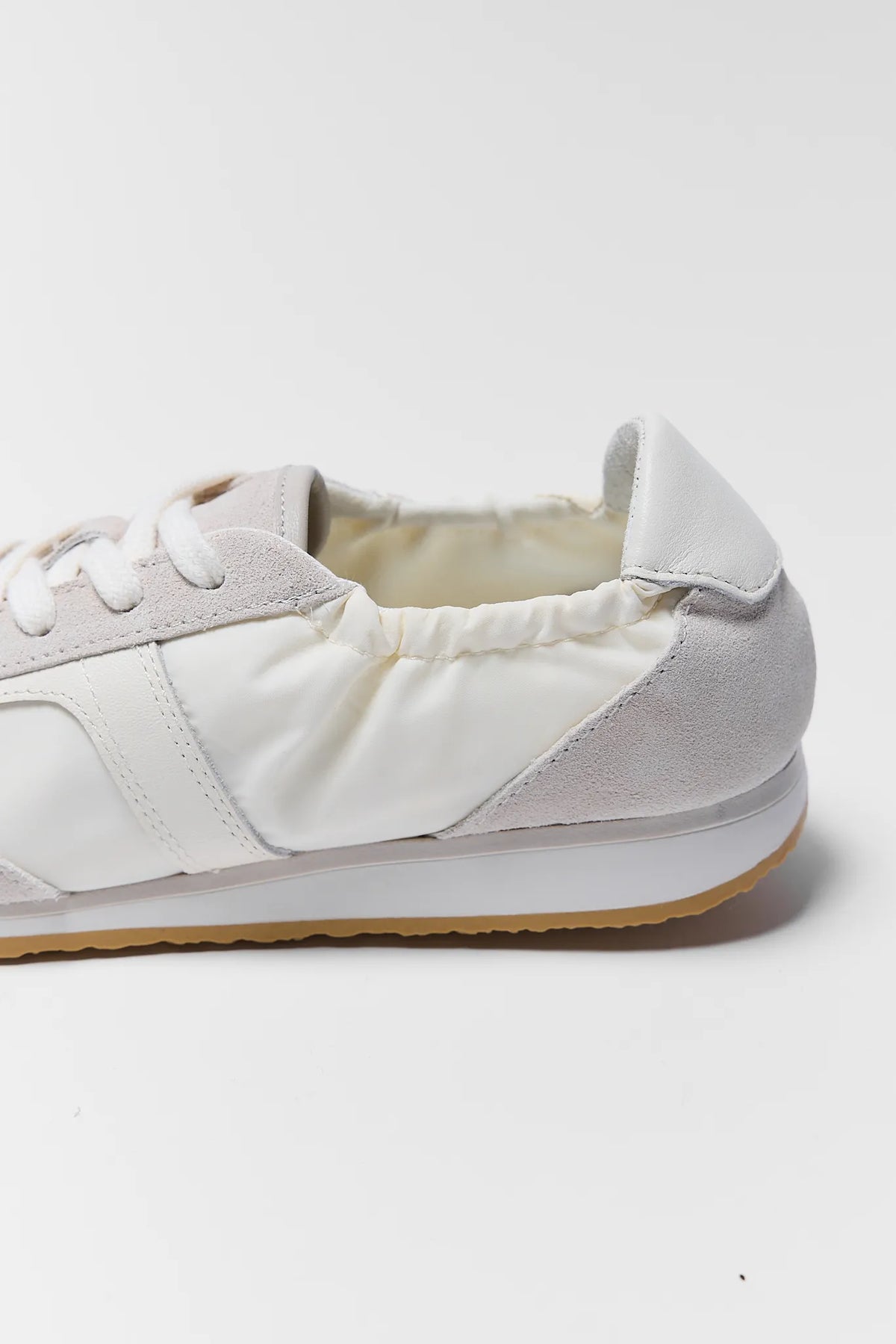Dolce Vita Sariya white sneakers nylon upper and gum sole close-up collar detail | Avara