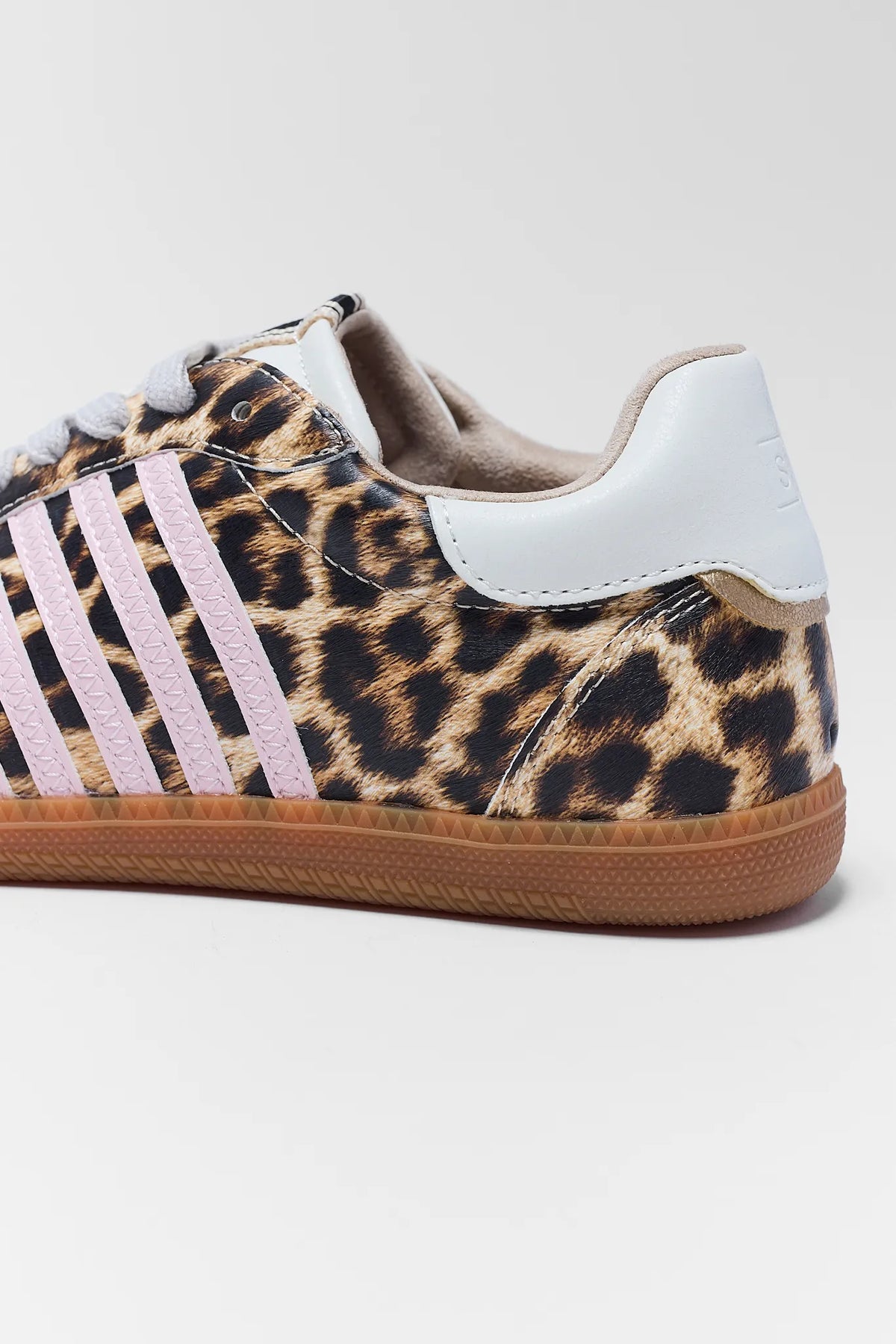 Stevie Leopard Striped Sneakers, heel close-up detail, pink stripe and gum sole on leopard print upper | Avara