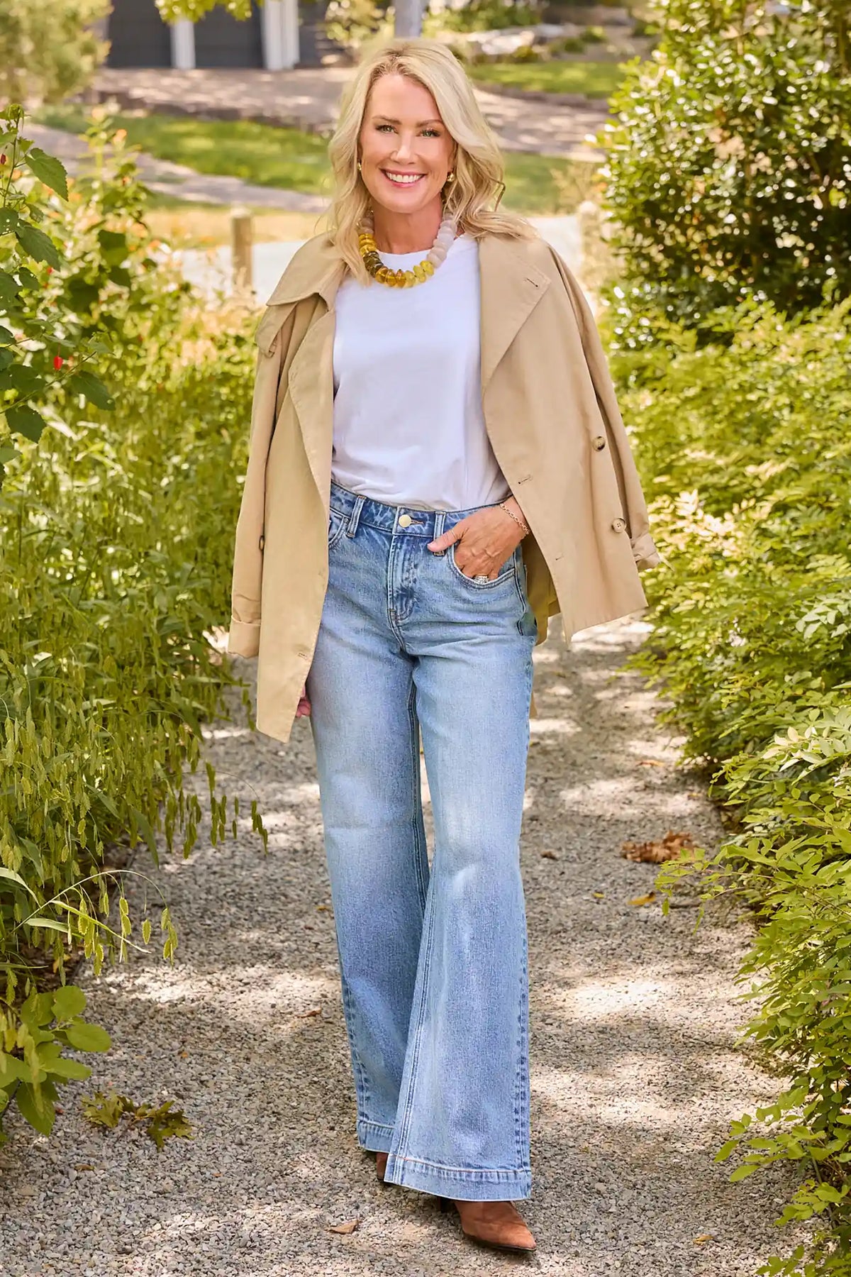 Tan Belted Short Trench Coat worn open over white tee and wide-leg jeans - Full Length Lifestyle Shot | Avara