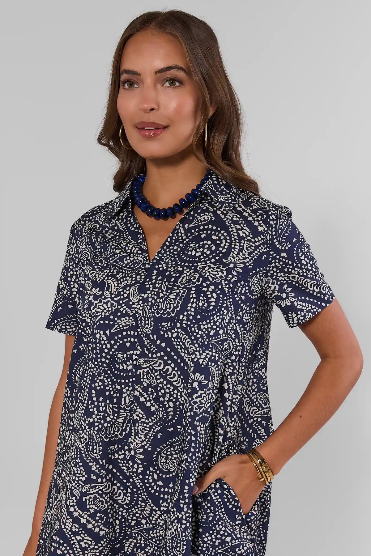 Tia Navy Printed Collared Short Dress close-up, bandana print detail and V-neckline collar | Avara