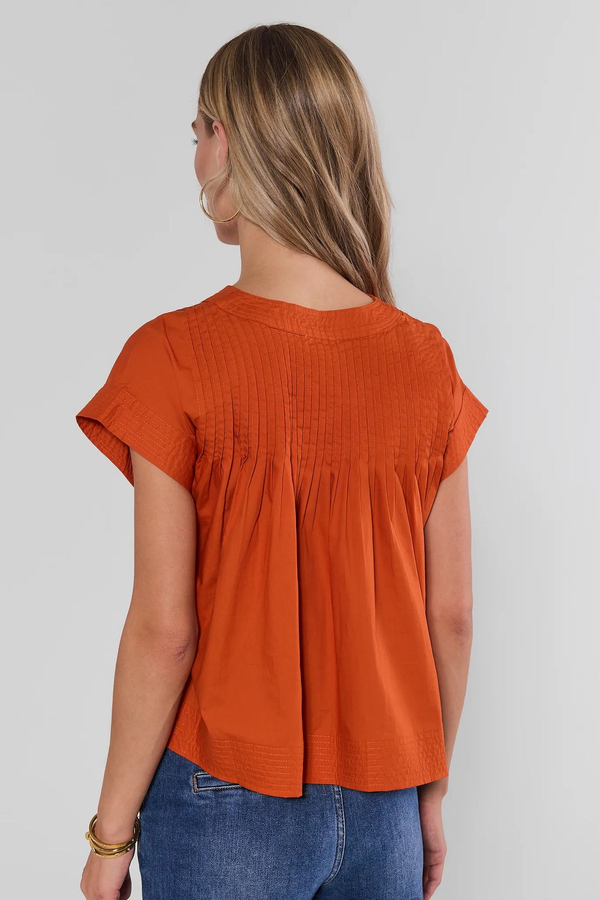 Orange Pleated Button Up Top back view showing pintuck pleating and relaxed silhouette | Avara