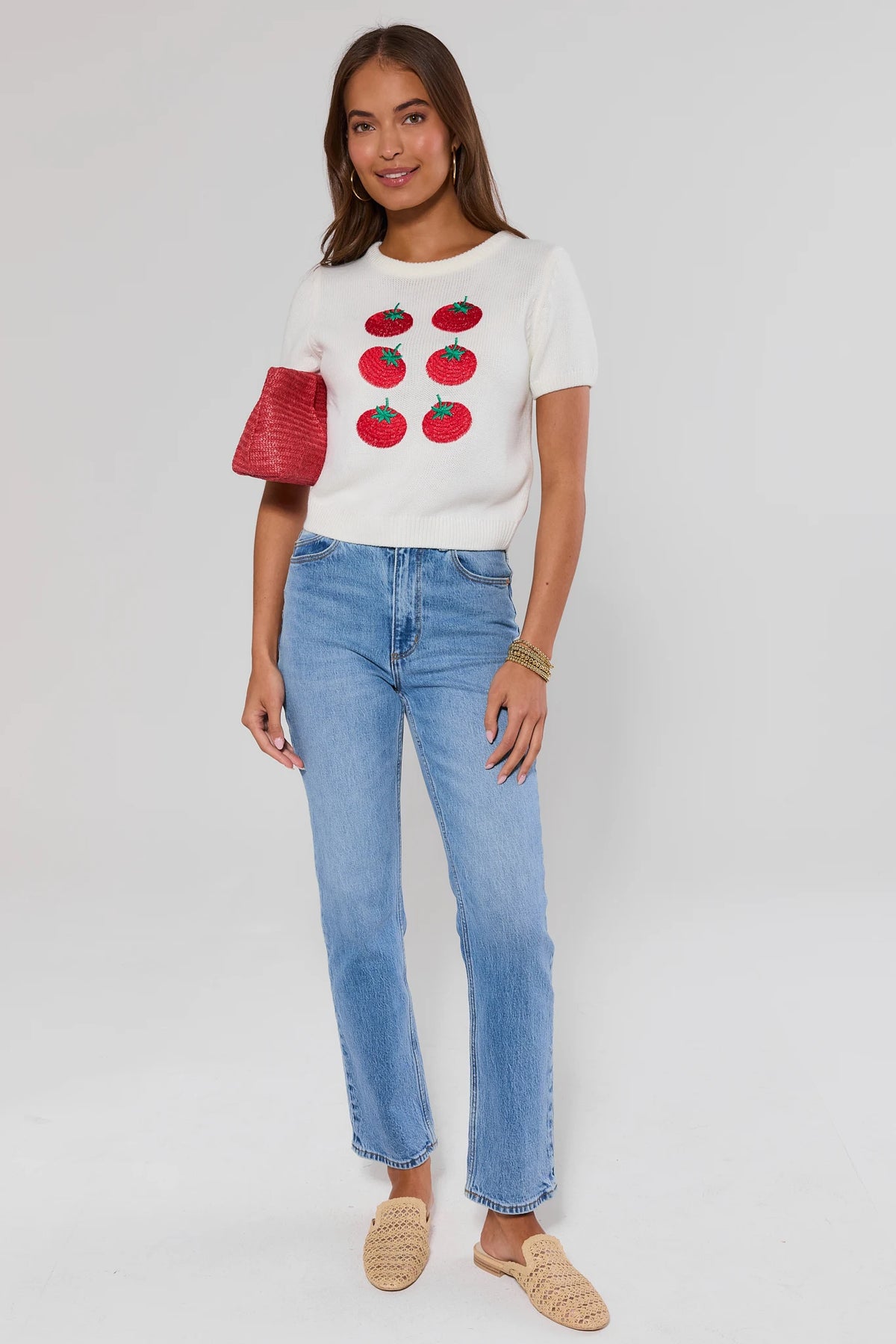 White tomato print knit top styled with blue jeans and woven mules - Full Length Styled Look | Avara