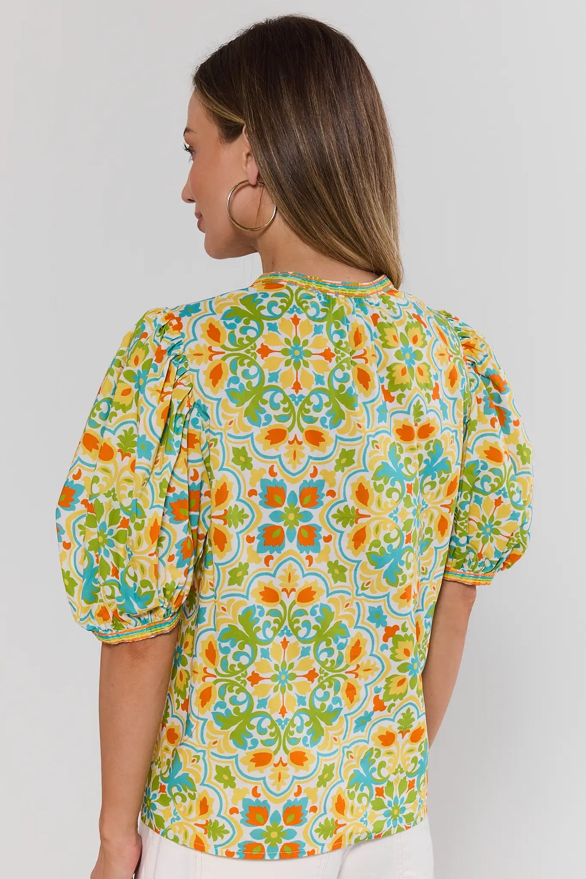 Allister Multi Printed Split Neck Top - colorful abstract print women's top, back view showing puff sleeves | Avara