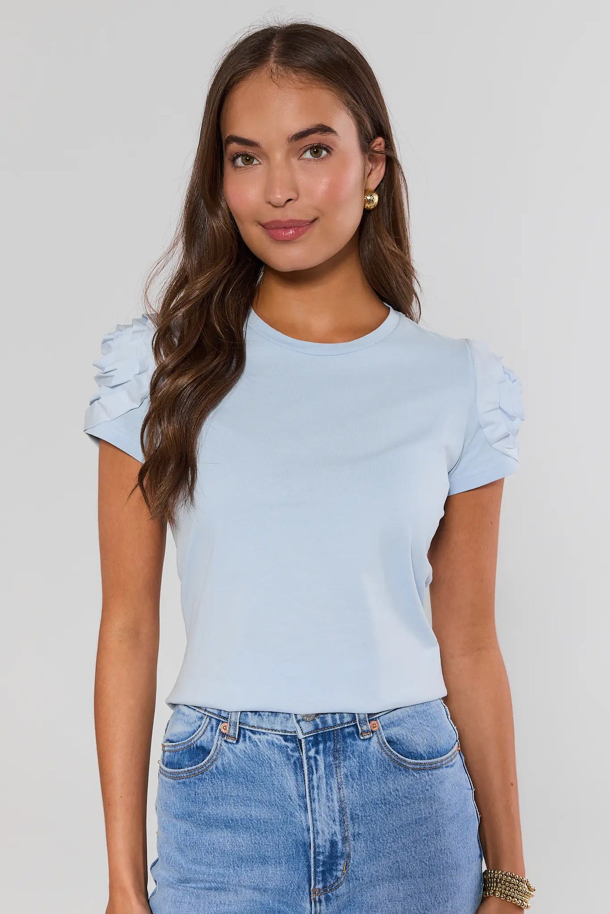 Light blue Kendall Floral Appliqué Top styled with jeans - Front View, cute top for women | Avara