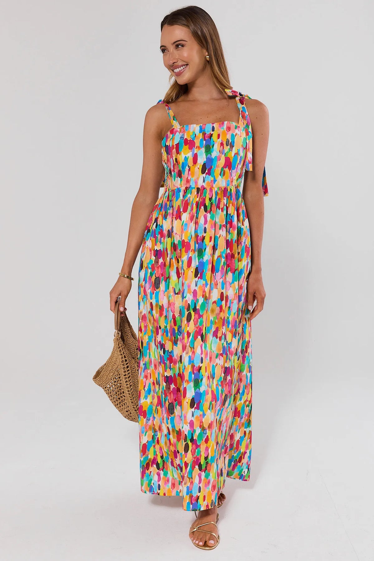 Multi Colorful Abstract Print Smocked Midi Dress - Front View, On Model with Straw Bag | Avara