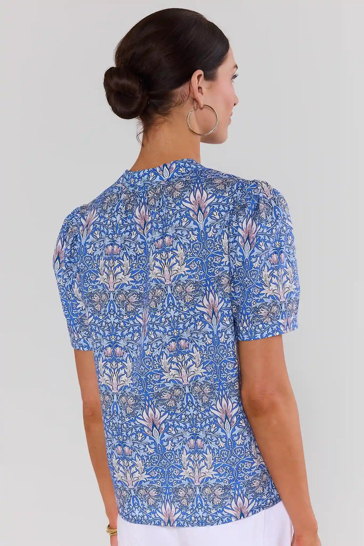 Blue Printed Split Neck Top back view showing allover floral print and short sleeves, on model | Avara