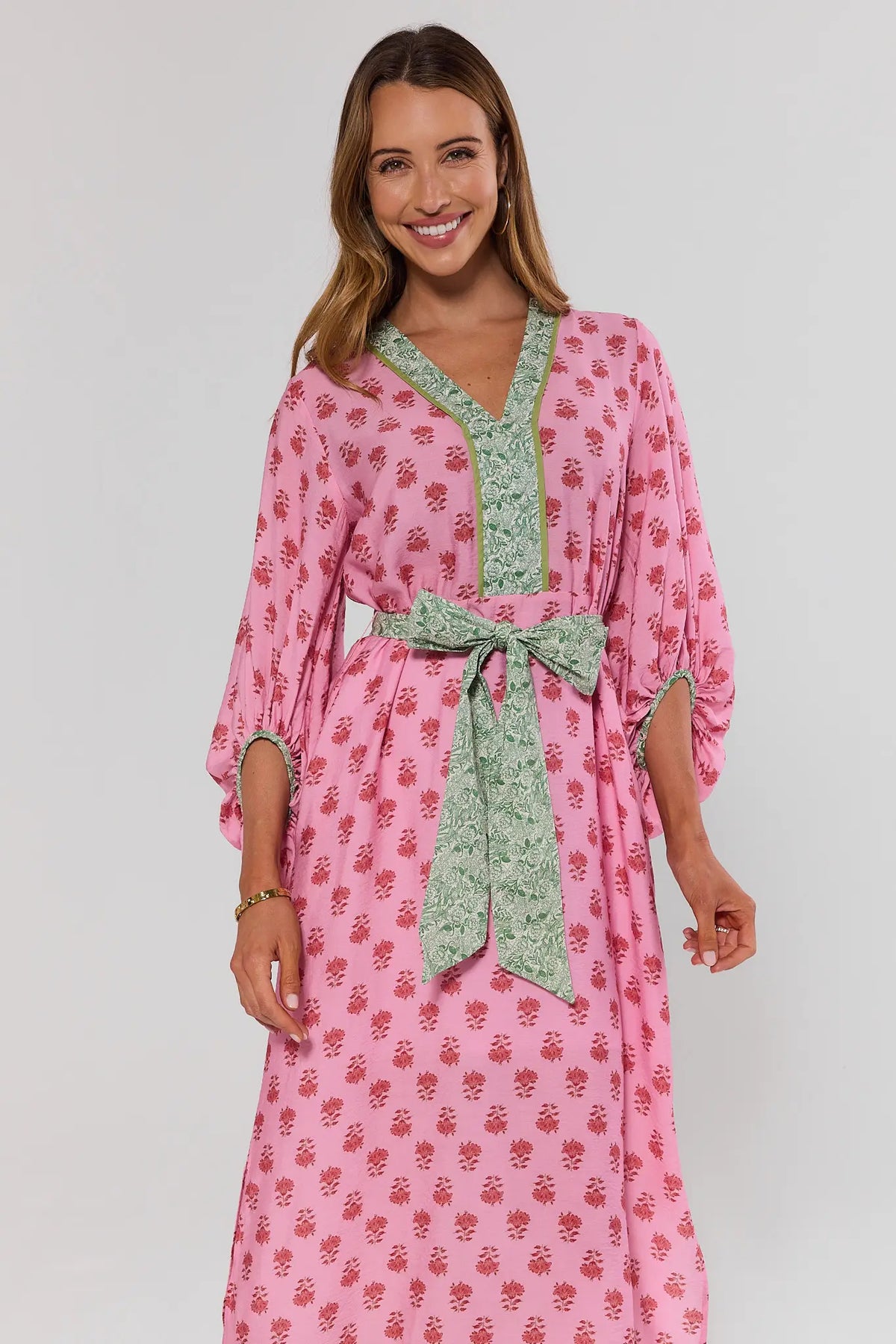 Tessa Pink Printed Tie Waist Dress - Front Upper Body, V-Neckline with Green Floral Contrast Trim | Avara