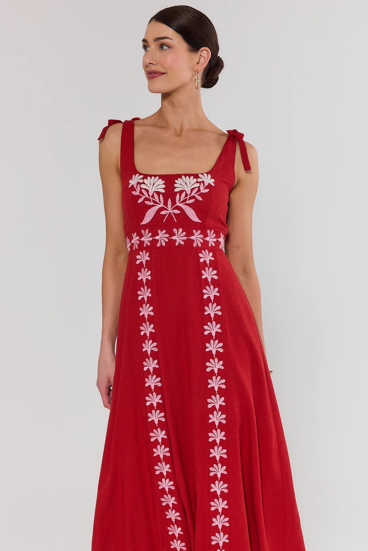 Nancy Red Embroidered Midi Dress - Front Crop View, White Floral Embroidery Detail | Avara