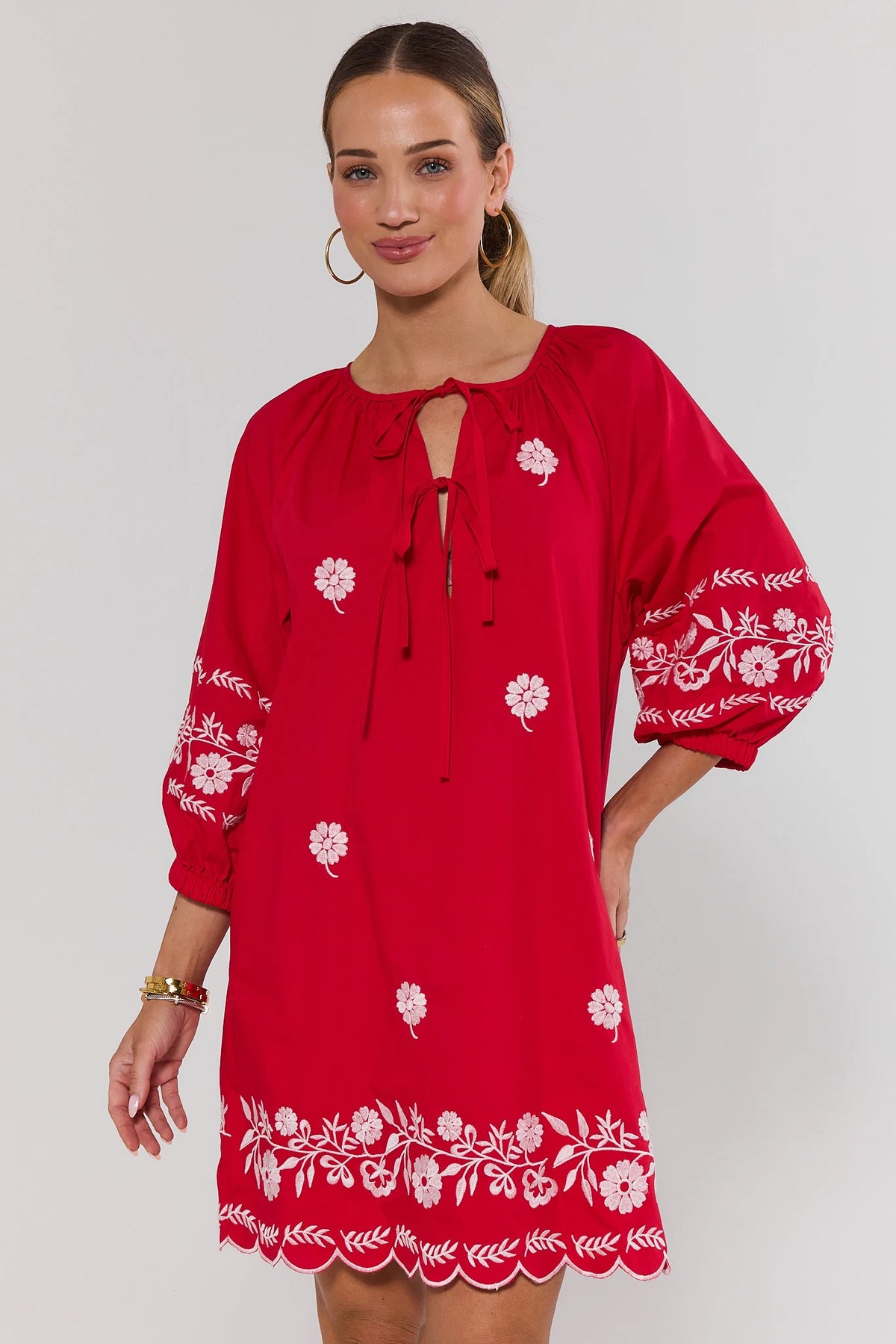 Tara Red Embroidered Short Dress, front view, white floral embroidery, tie neckline, balloon sleeves | Avara