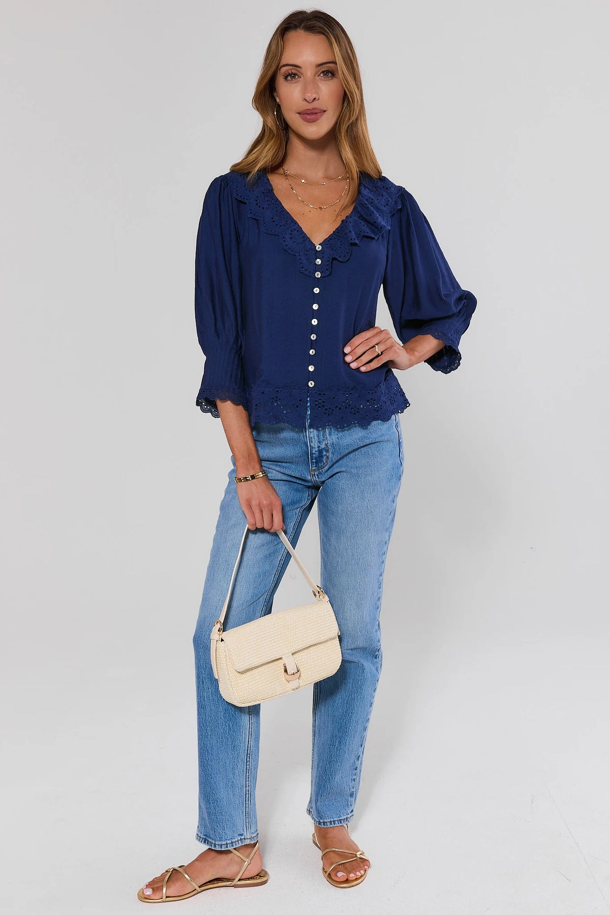 Navy Embroidered Button Up Top styled with blue jeans and cream bag - Full Look | Avara