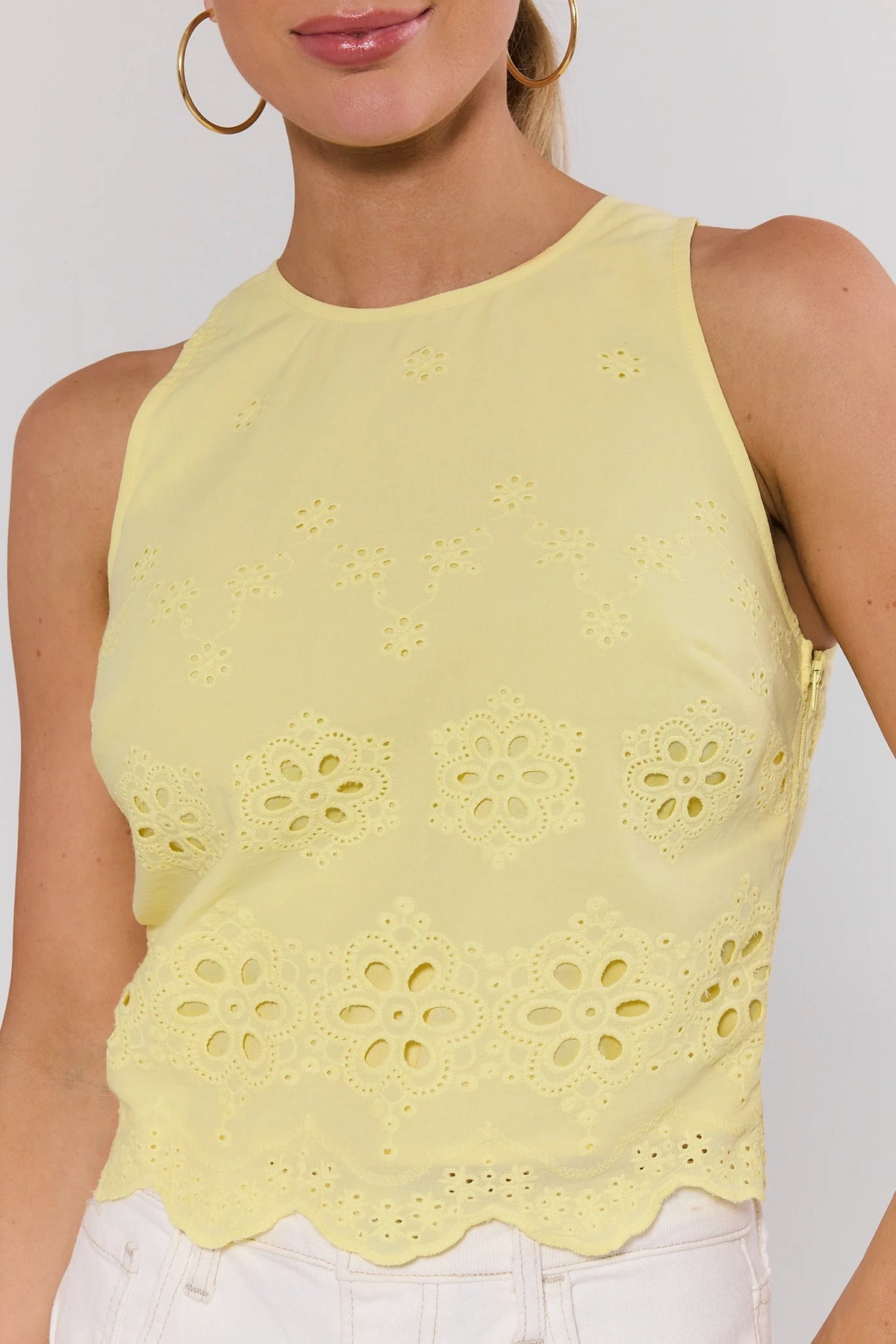 Yellow eyelet tank top floral cut-out embroidery and scalloped hem, close-up detail | Avara