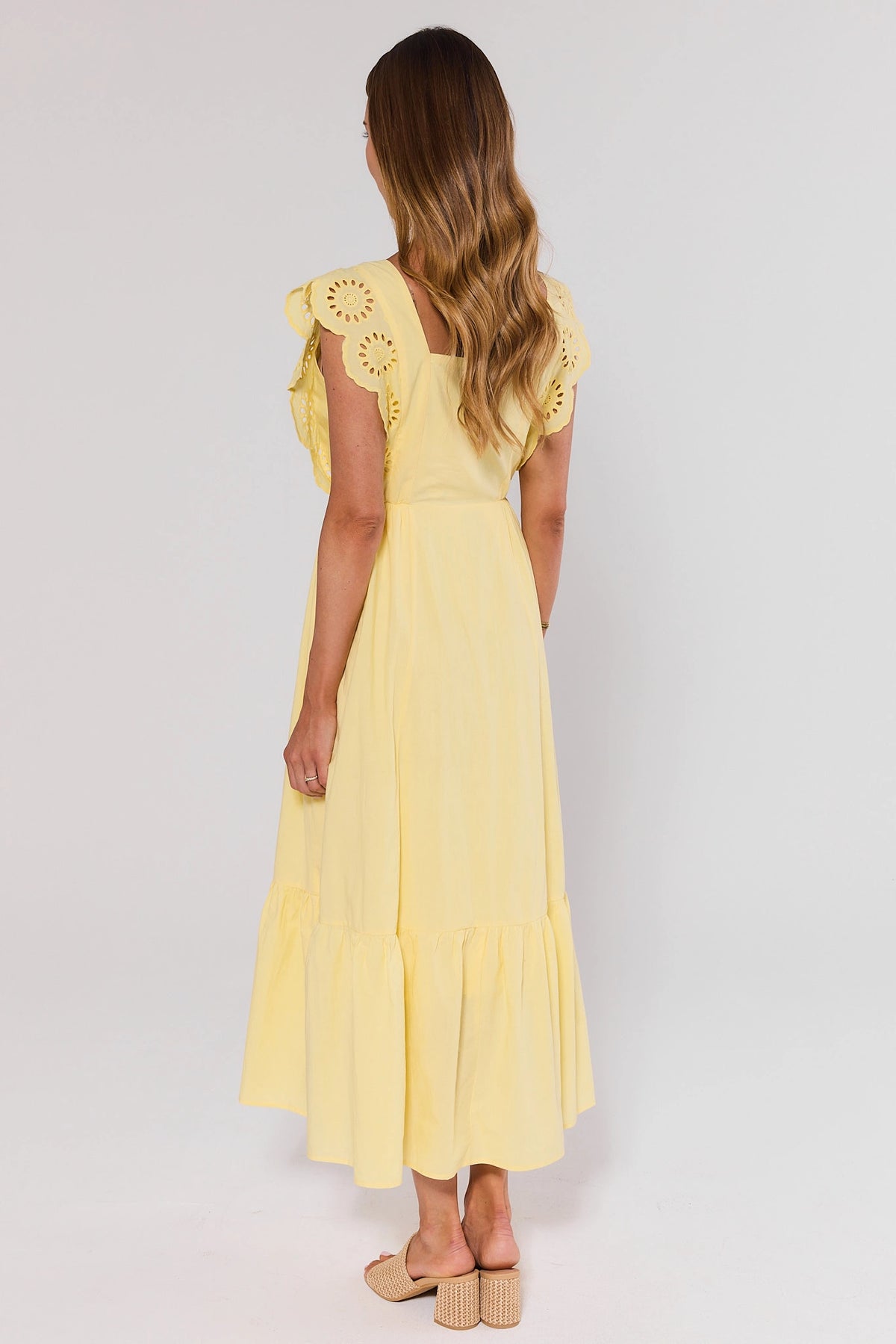 Yellow Eyelet Flutter Sleeve Midi Dress - Back View Showing Tiered Hem & Flutter Sleeves | Avara