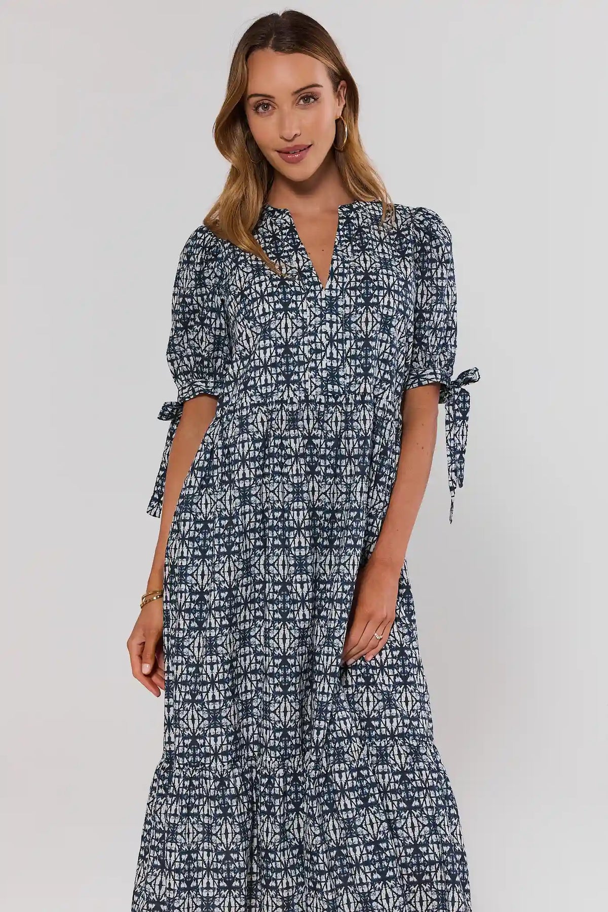 Navy Print Tiered Midi Dress - Front View, V-Neckline & Tie Sleeves | Avara