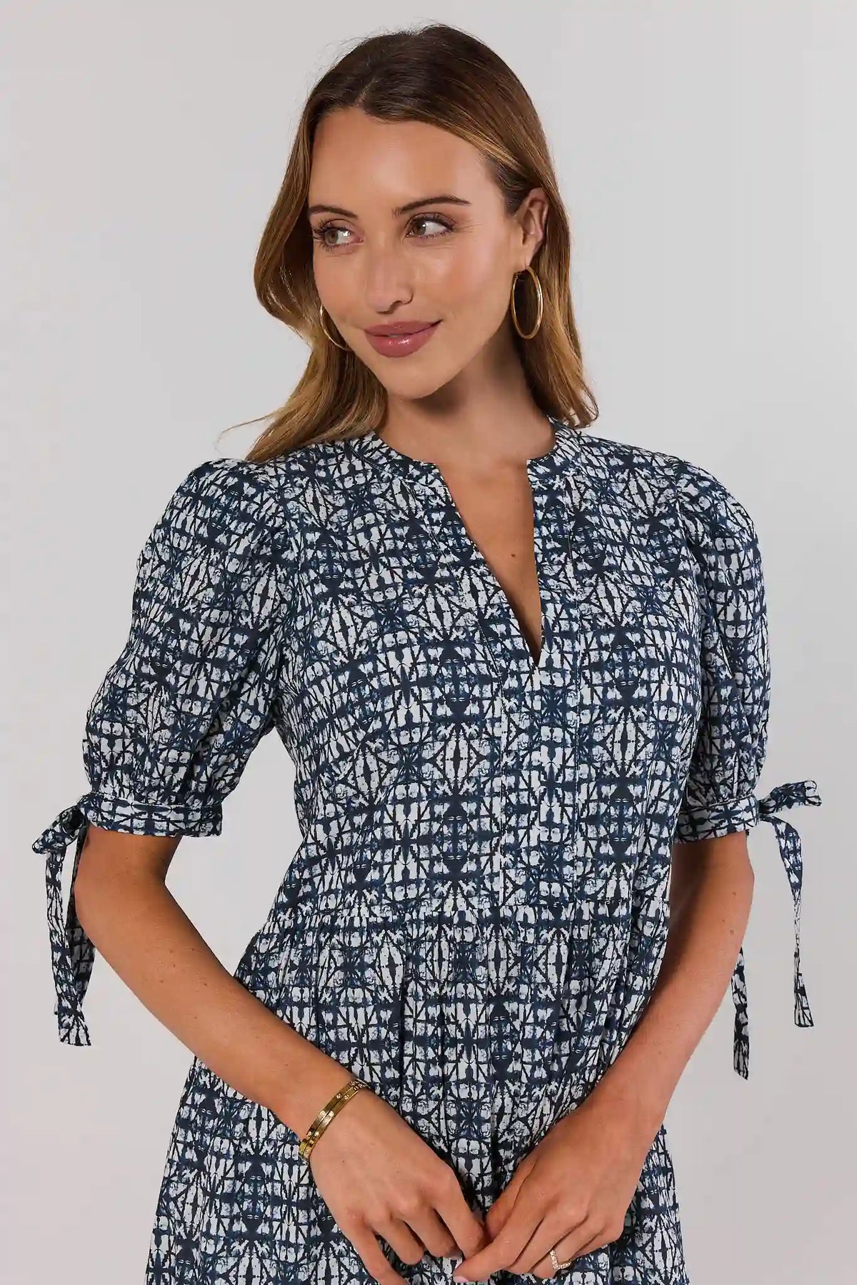 Navy Print Tiered Midi Dress - Close-Up Detail, Tie Sleeve & V-Neckline | Avara