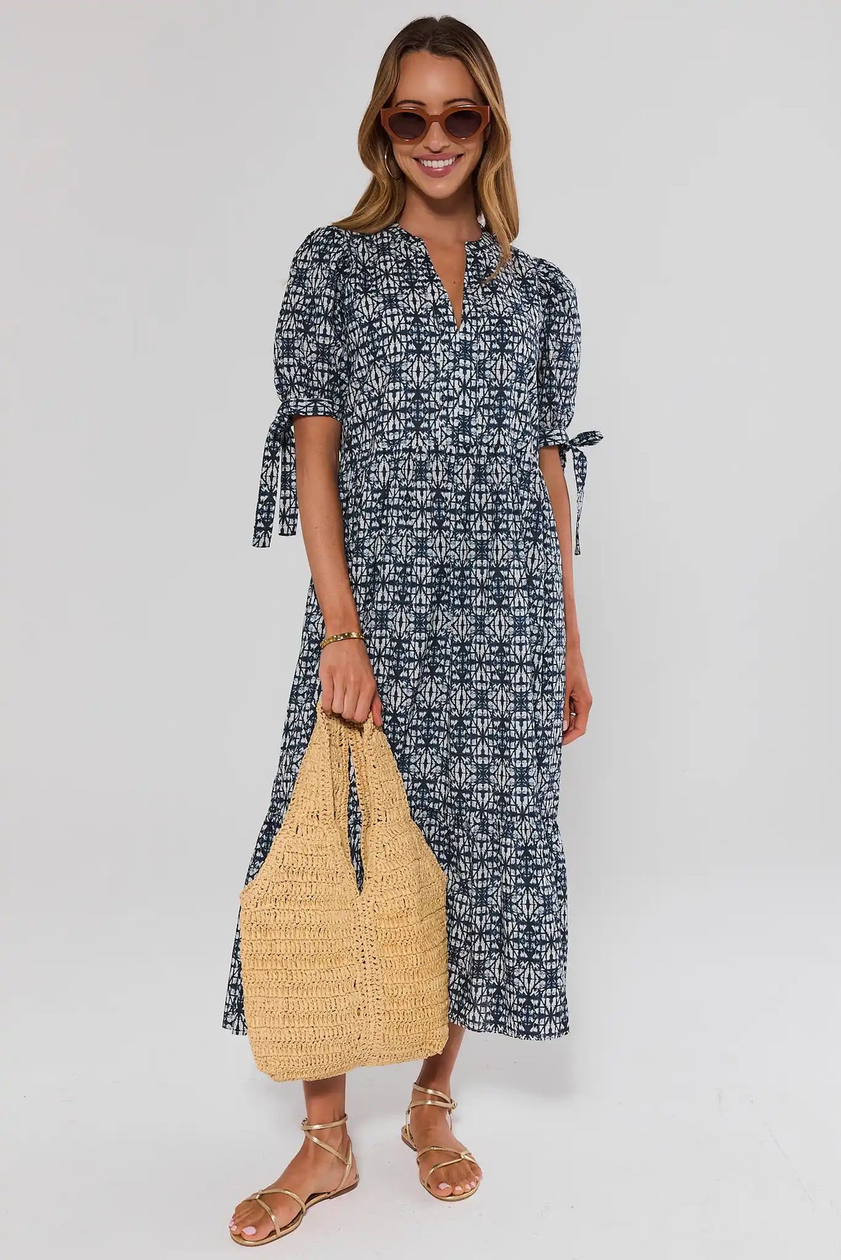 Navy Tiered Midi Dress Styled with Woven Bag & Gold Sandals - Full Length | Avara