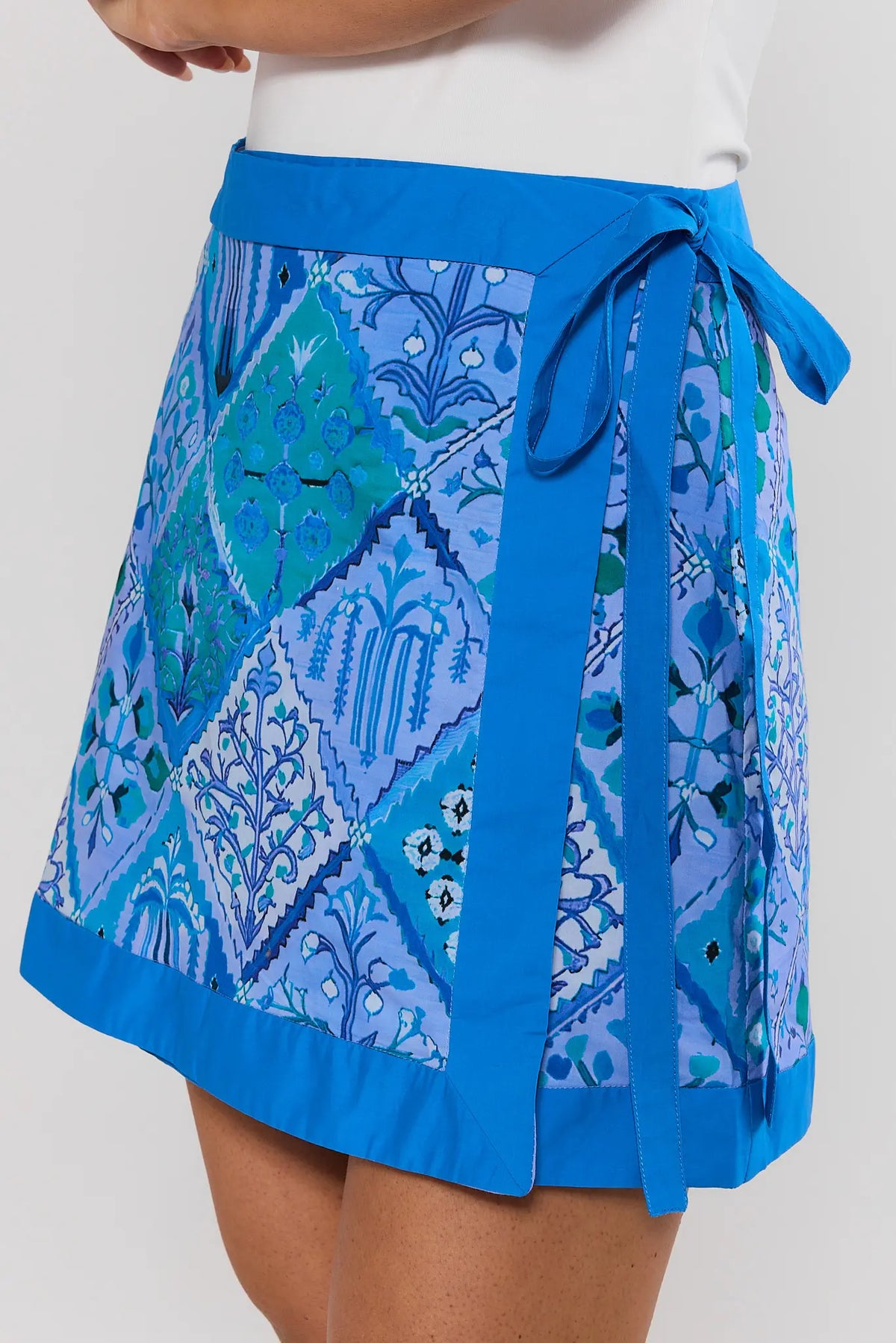 Blue patterned skirt with a white background lifestyle