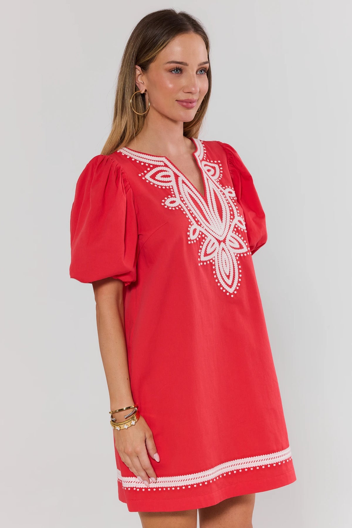 Roxanne Red Embroidered Short Dress side profile highlighting puff sleeve and embroidered neckline | Avara