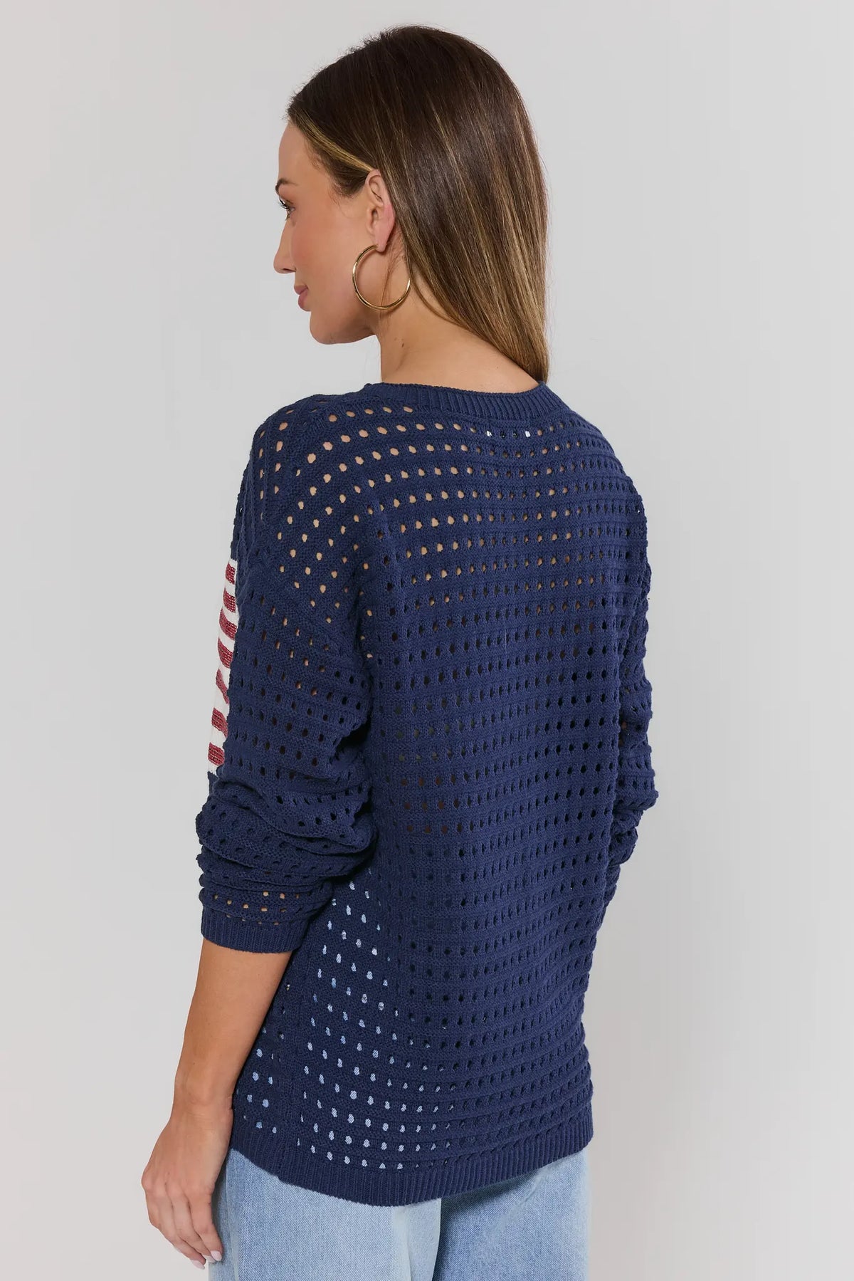 Starla Navy Crochet Sweater open-knit back with flag peek at sleeve - Back View | Avara