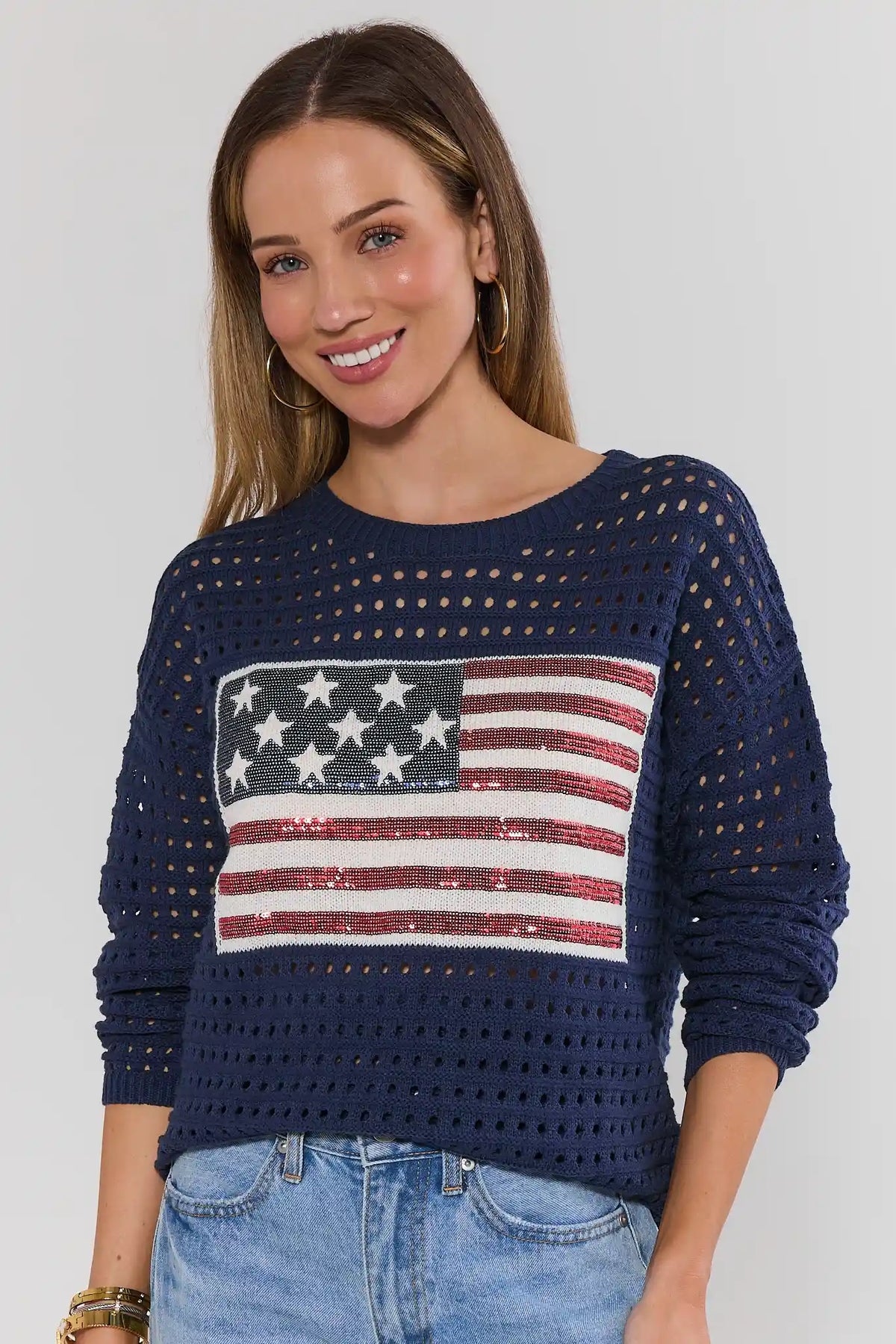 Starla Navy Sequin Flag Crochet Sweater with wide-leg jeans - Full Length Front | Avara