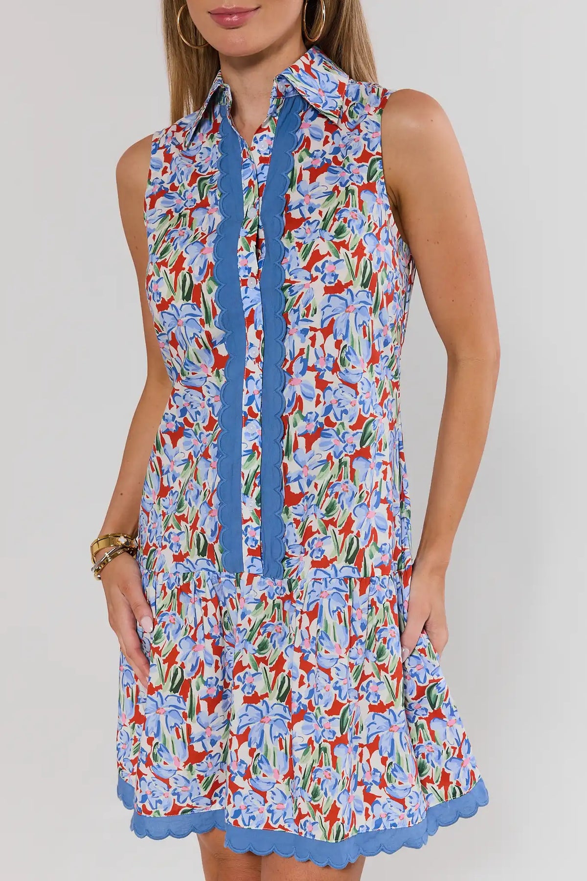 Blue Floral Drop Waist Short Dress scallop hem and button placket detail - Close-Up View | Avara