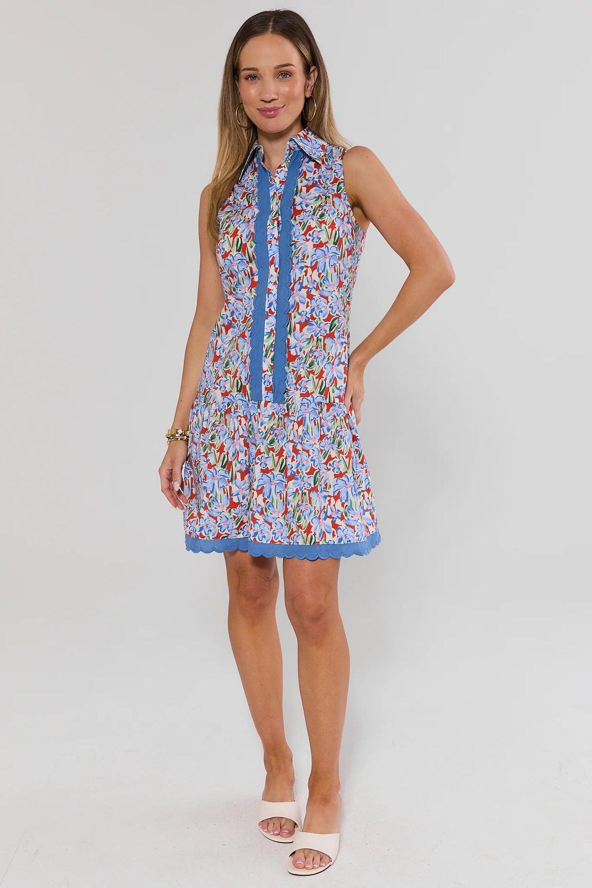 Blue Floral Drop Waist Short Dress full-length on model with white slides - Front Full View | Avara